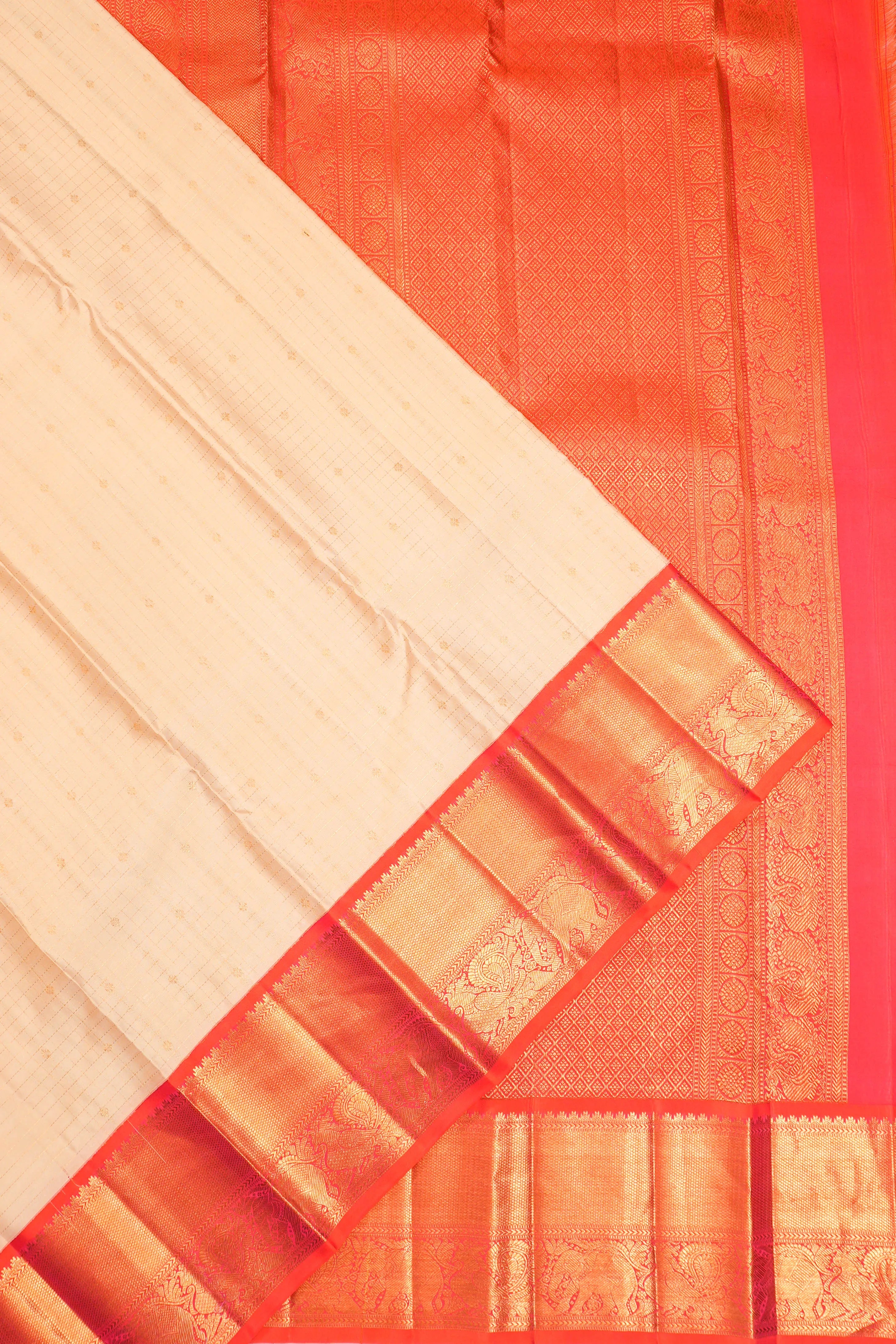 Taranga Kanchi Silk Checks And Butta Peach Saree