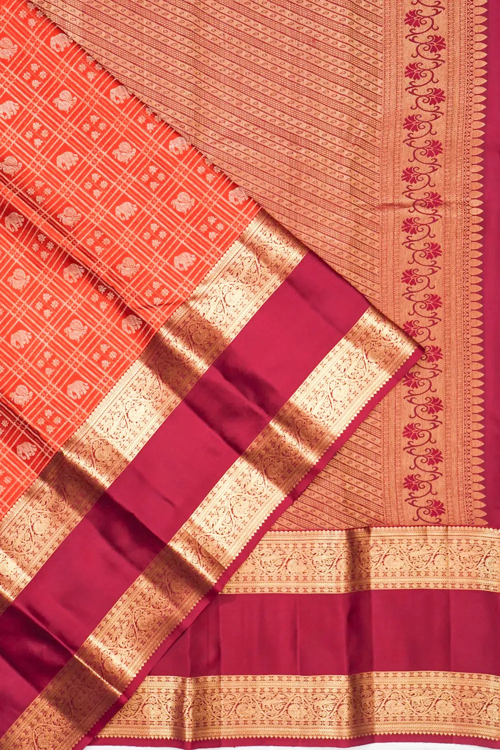 Taranga Kanchi Silk Checks And Butta Orange Saree