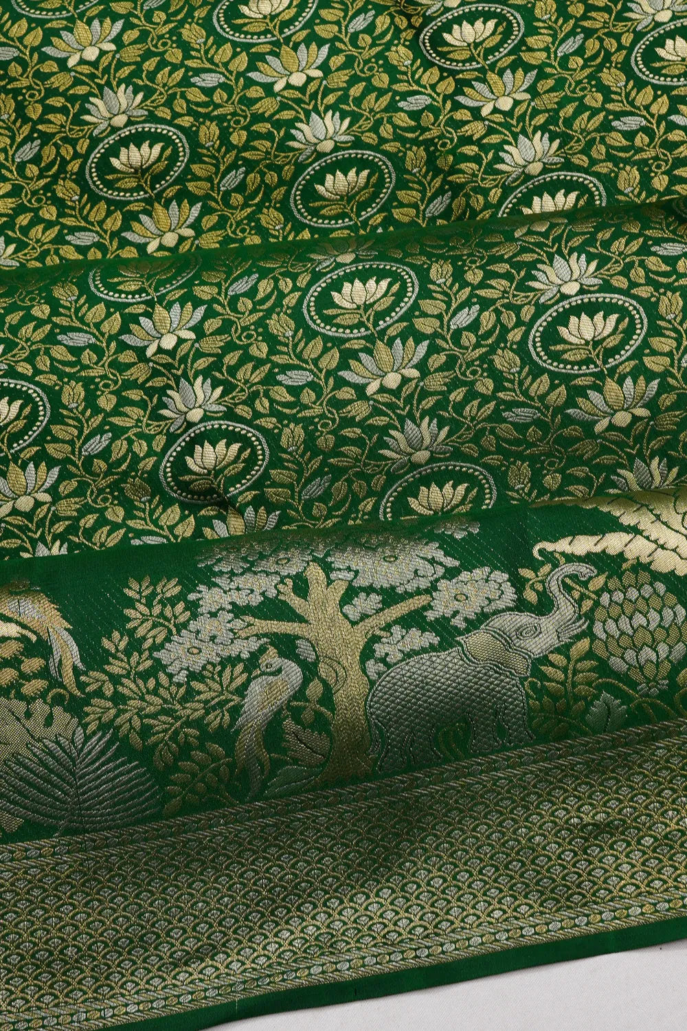 Taranga Kanchi Silk Brocade Bottle Green Saree