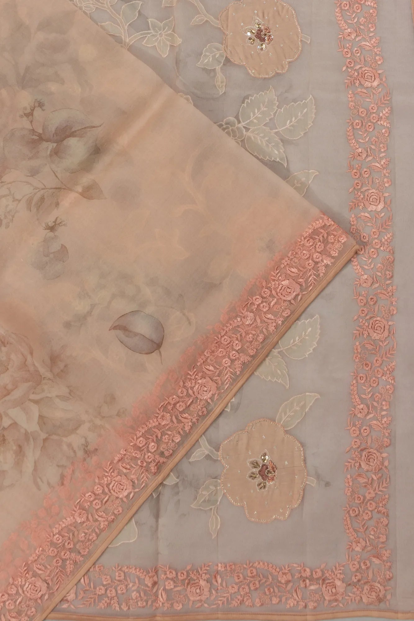 Organza Printed Pastel Orange Saree With Embroidery Border