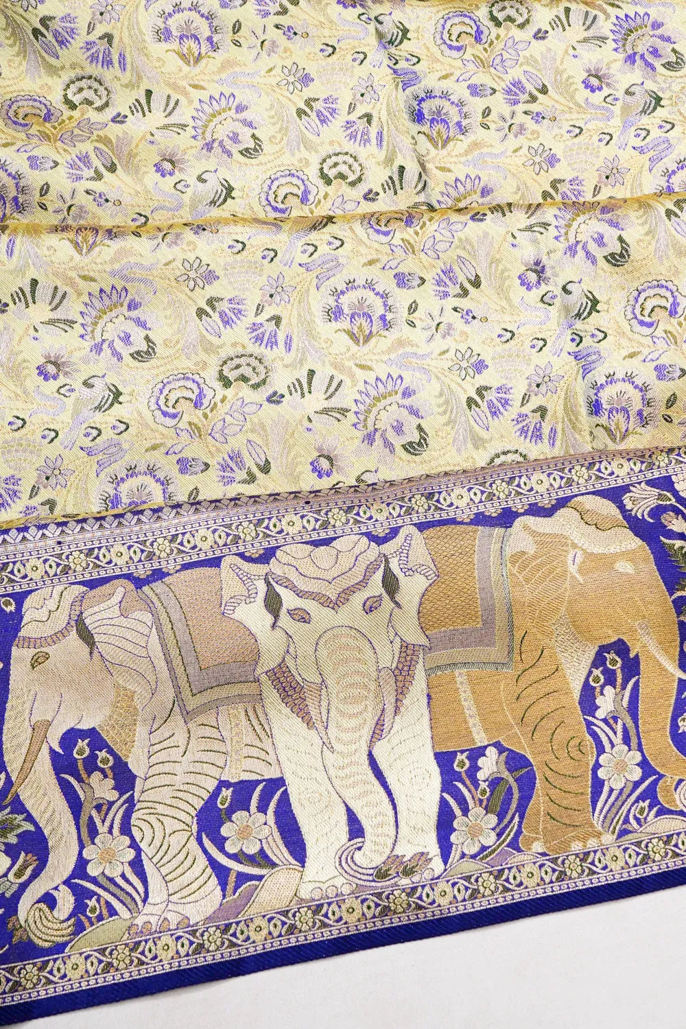 Taranga Kanchi Silk Tissue Brocade Cream Saree With Elephant Border
