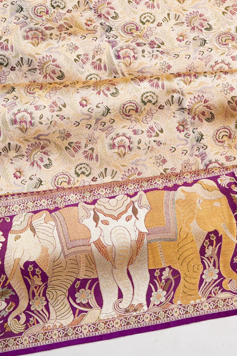 Taranga Kanchi Silk Tissue Brocade Cream Saree With Elephant Border