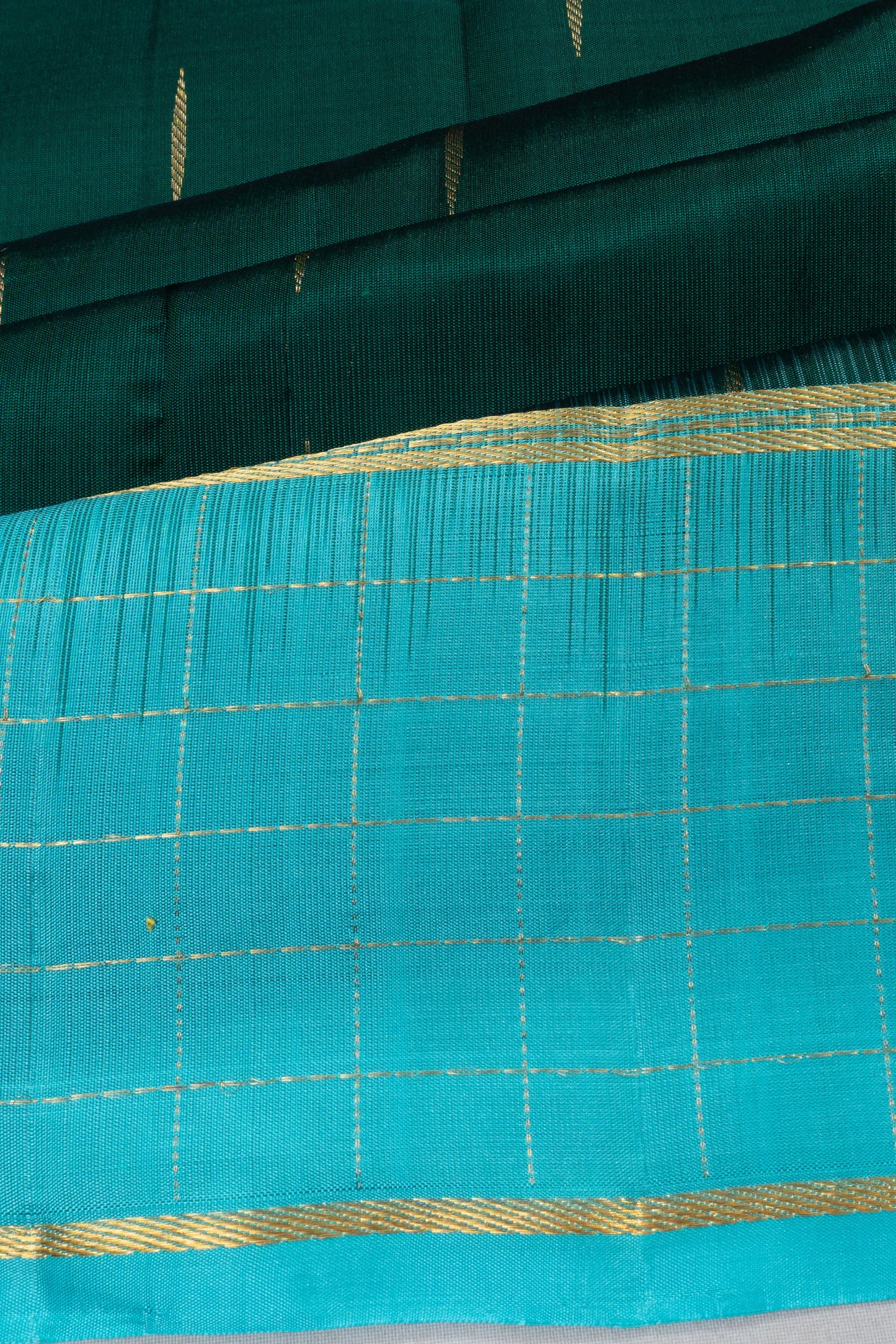 Taranga Kanchi Silk Butta Bottle Green Saree