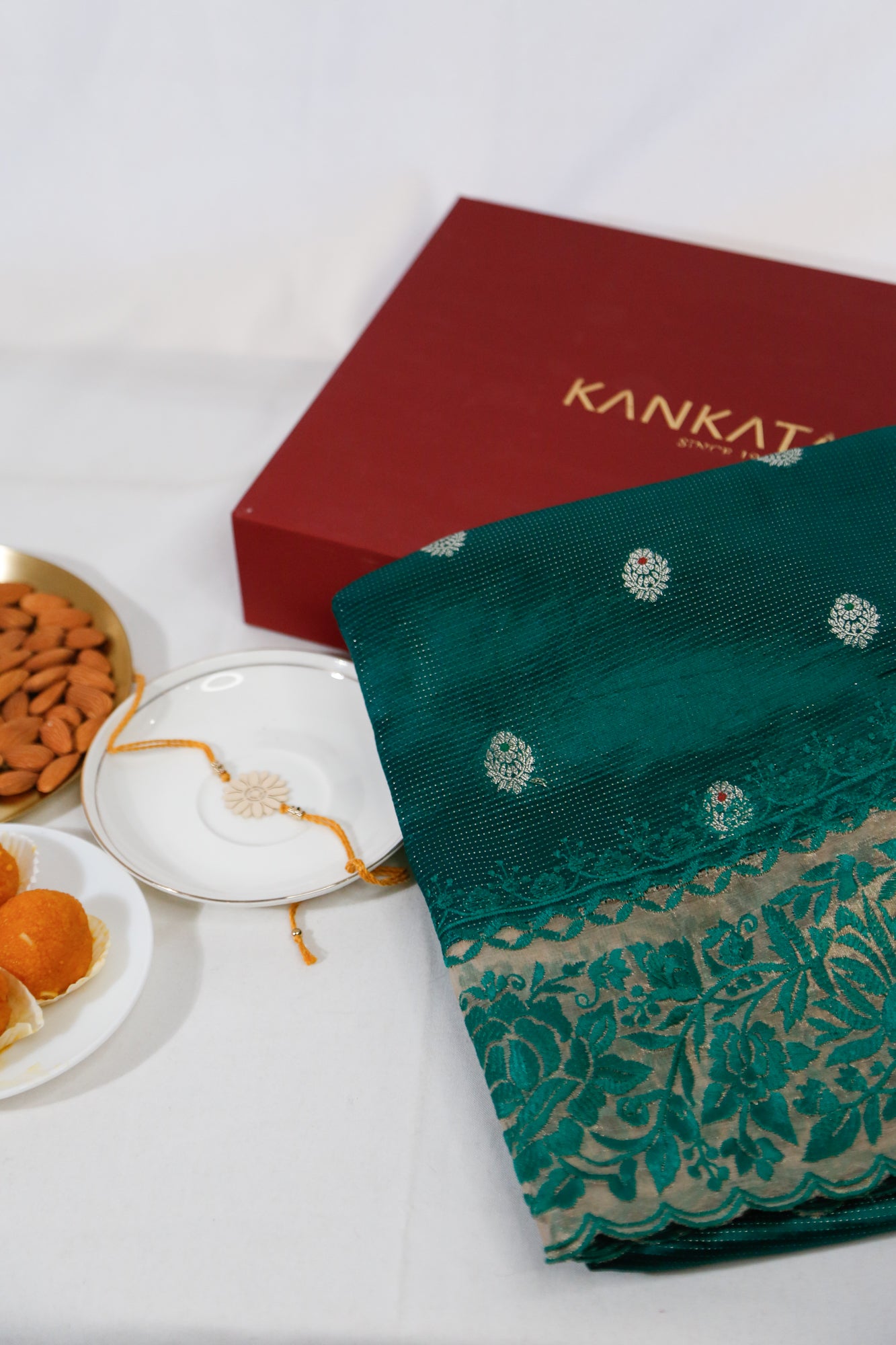 Soft Silk Butta Dark Green Saree With Kora Embroidery Border With Gift Box And Rakhi