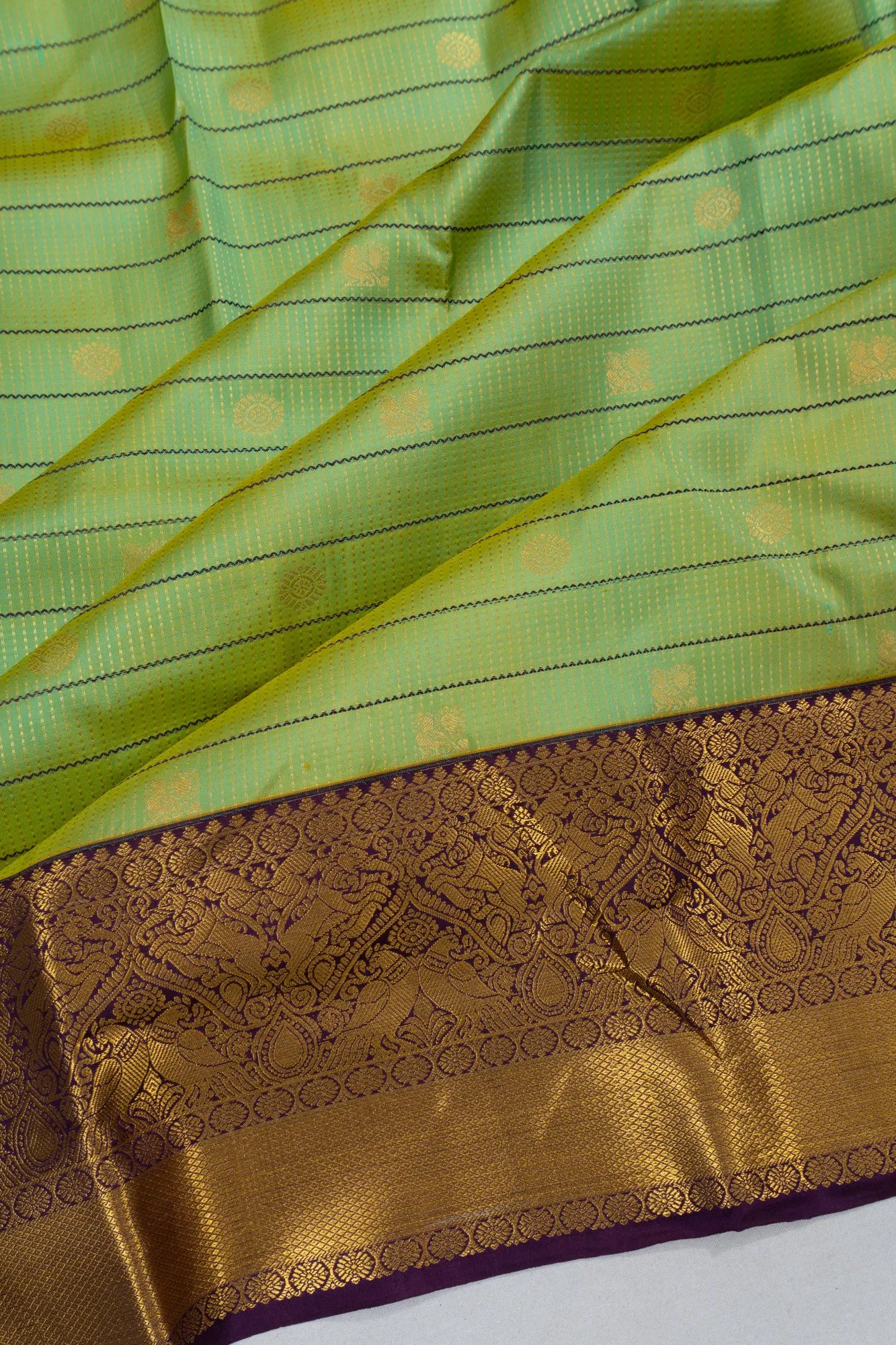 Taranga Kanchi Silk Brocade And Butta Green Saree