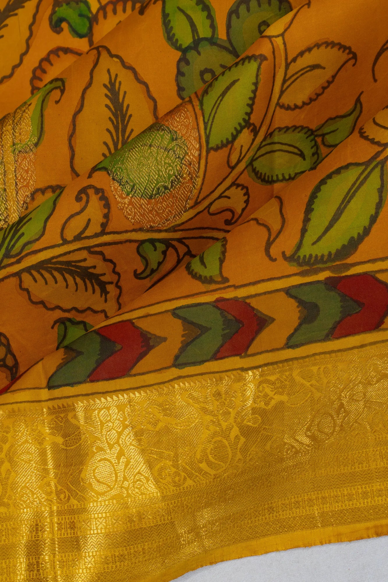 Kanchipuram Silk Kalamkari Hand Painted Butta Orange Saree