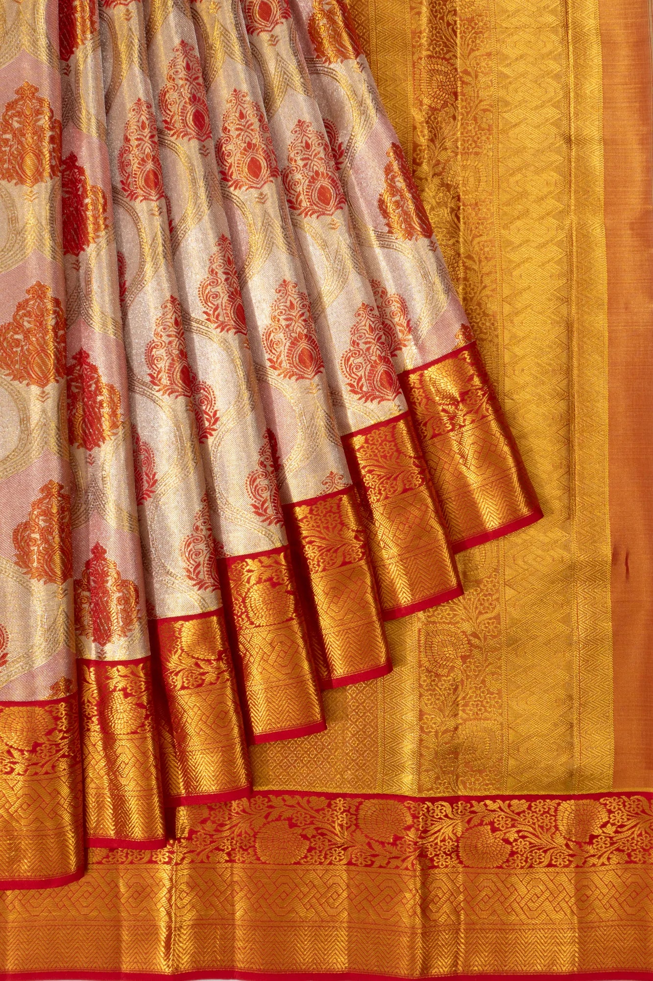 Taranga Kanchi Silk Tissue Jaal Pink And Cream Saree