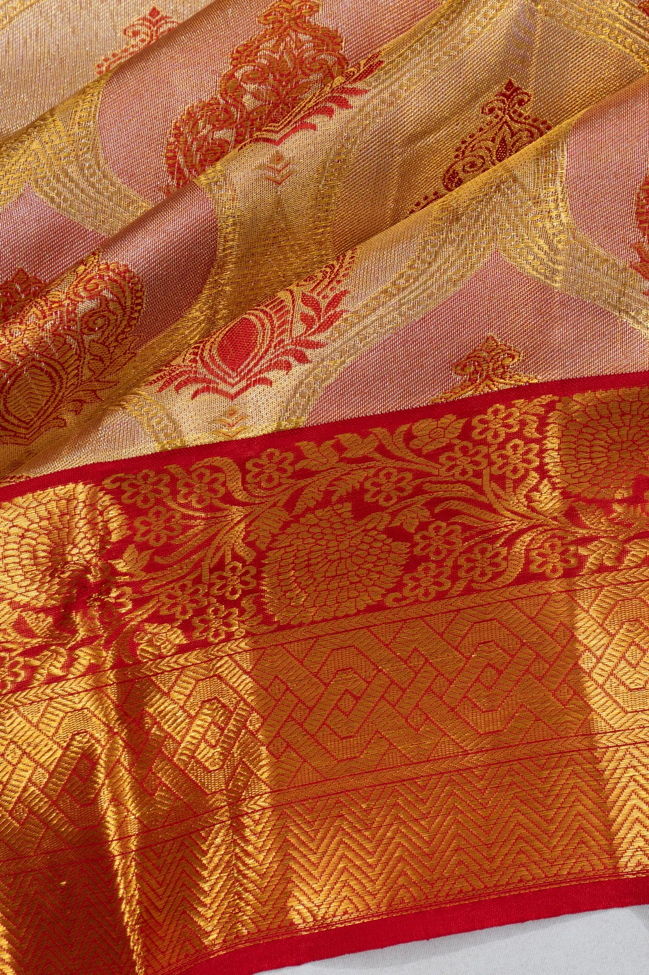 Taranga Kanchi Silk Tissue Jaal Pink And Cream Saree