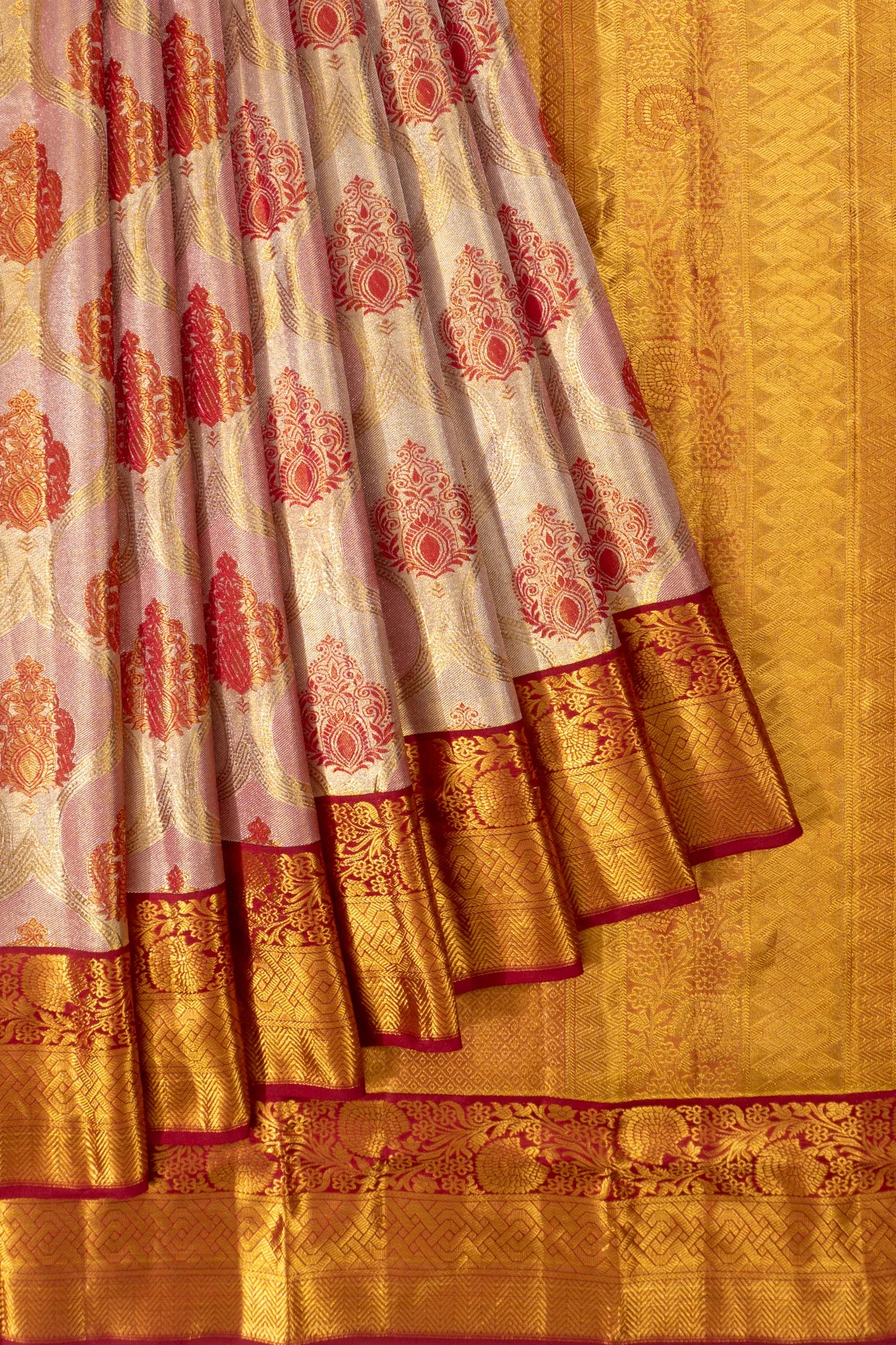Taranga Kanchi Silk Tissue Jaal Pink And Cream Saree