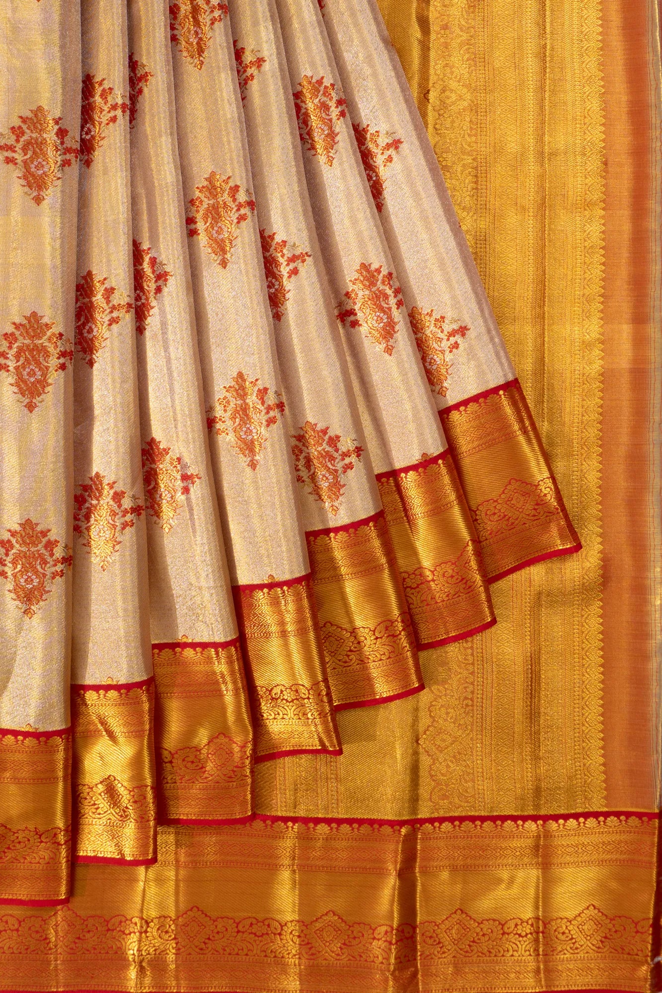 Taranga Kanchi Silk Tissue Butta Cream Saree