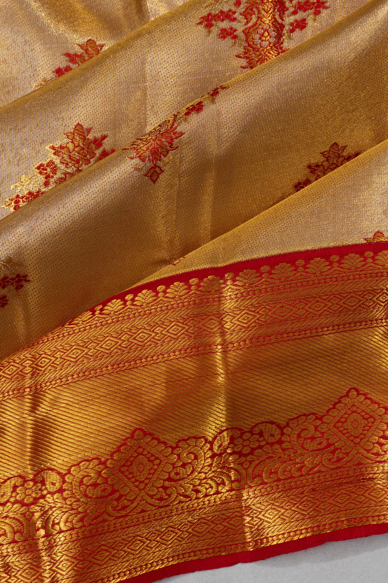 Taranga Kanchi Silk Tissue Butta Cream Saree