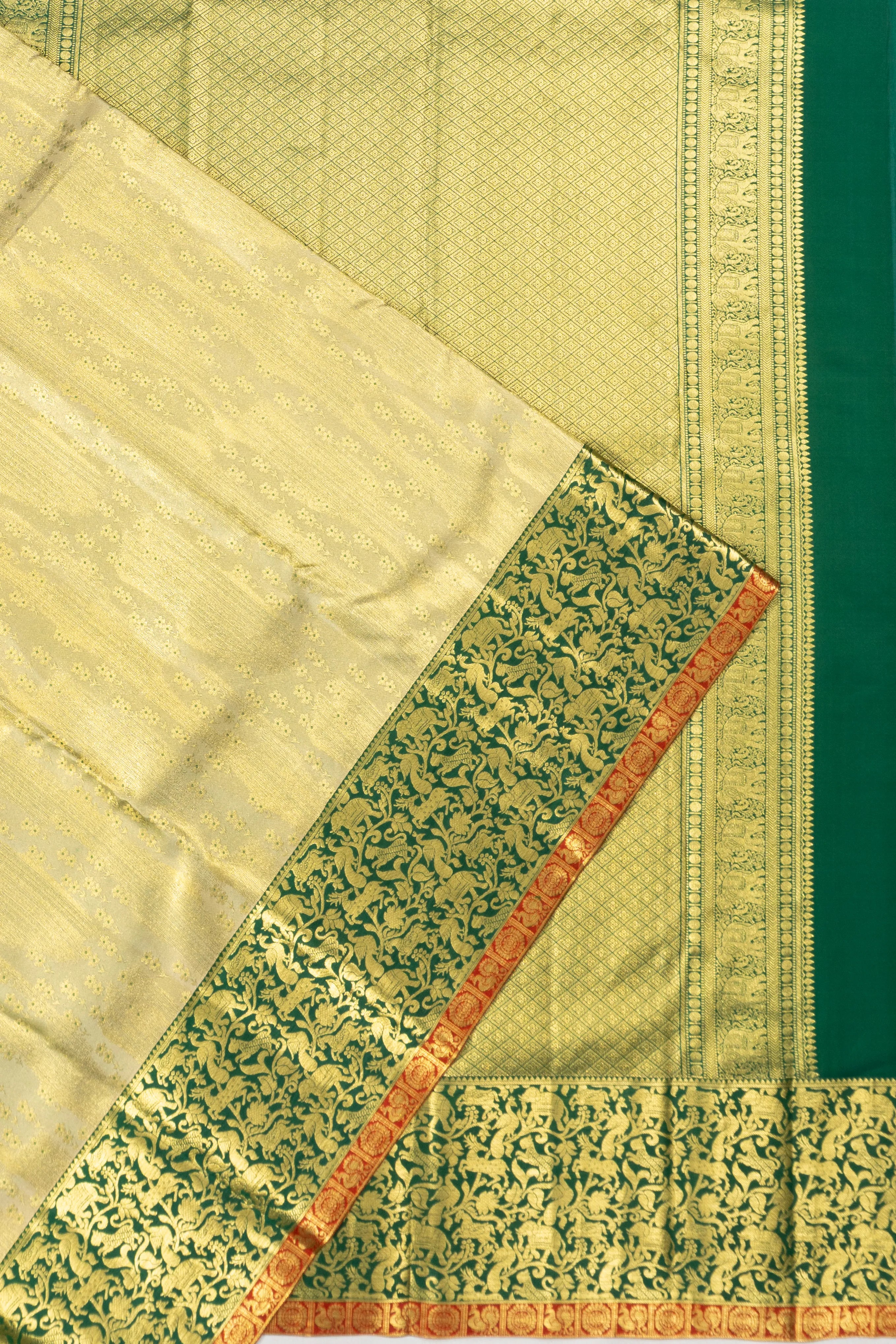 Taranga Kanchi Silk Tissue Brocade Cream Saree