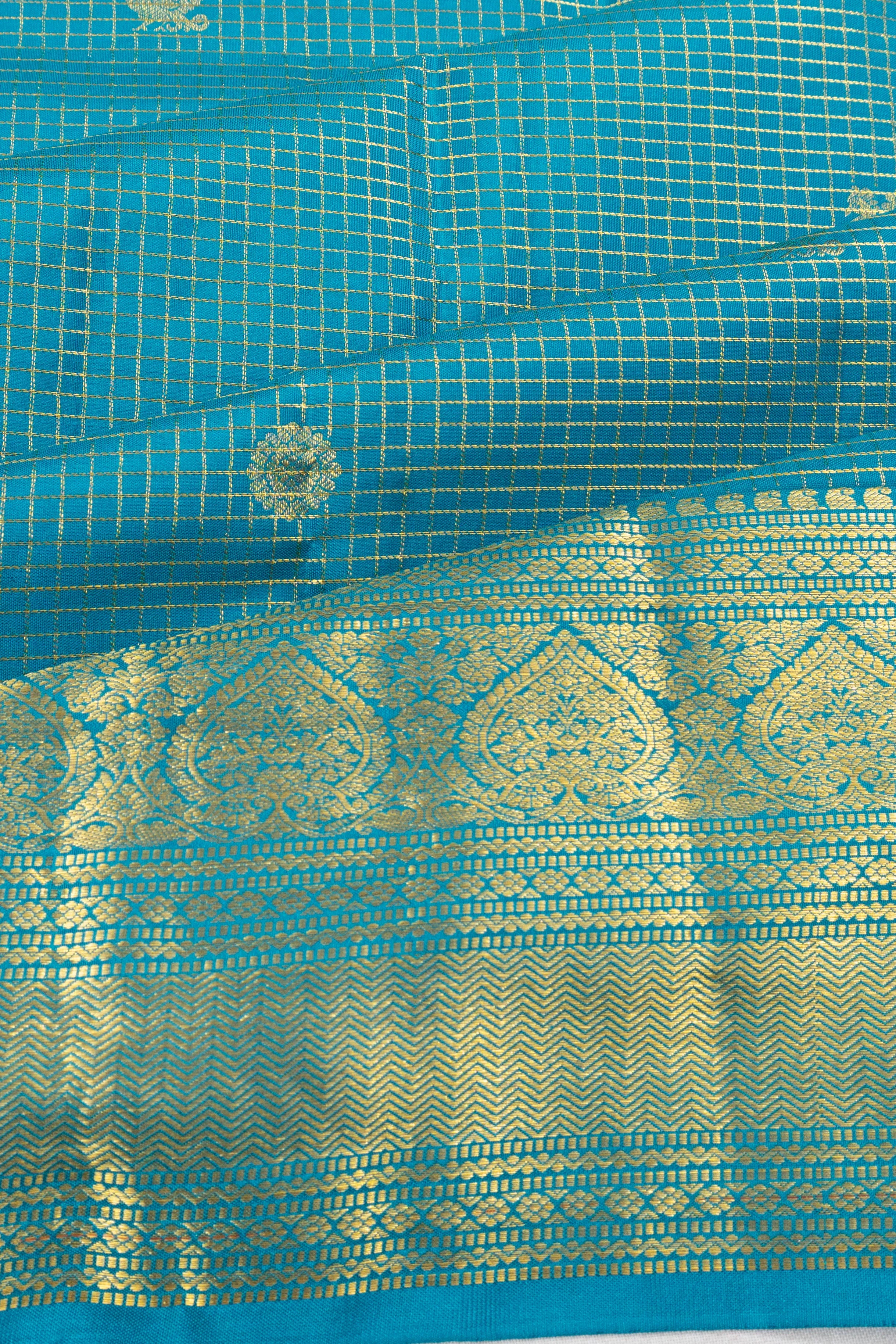 Taranga Kanchi Silk Checks And Butta Sky Blue Saree