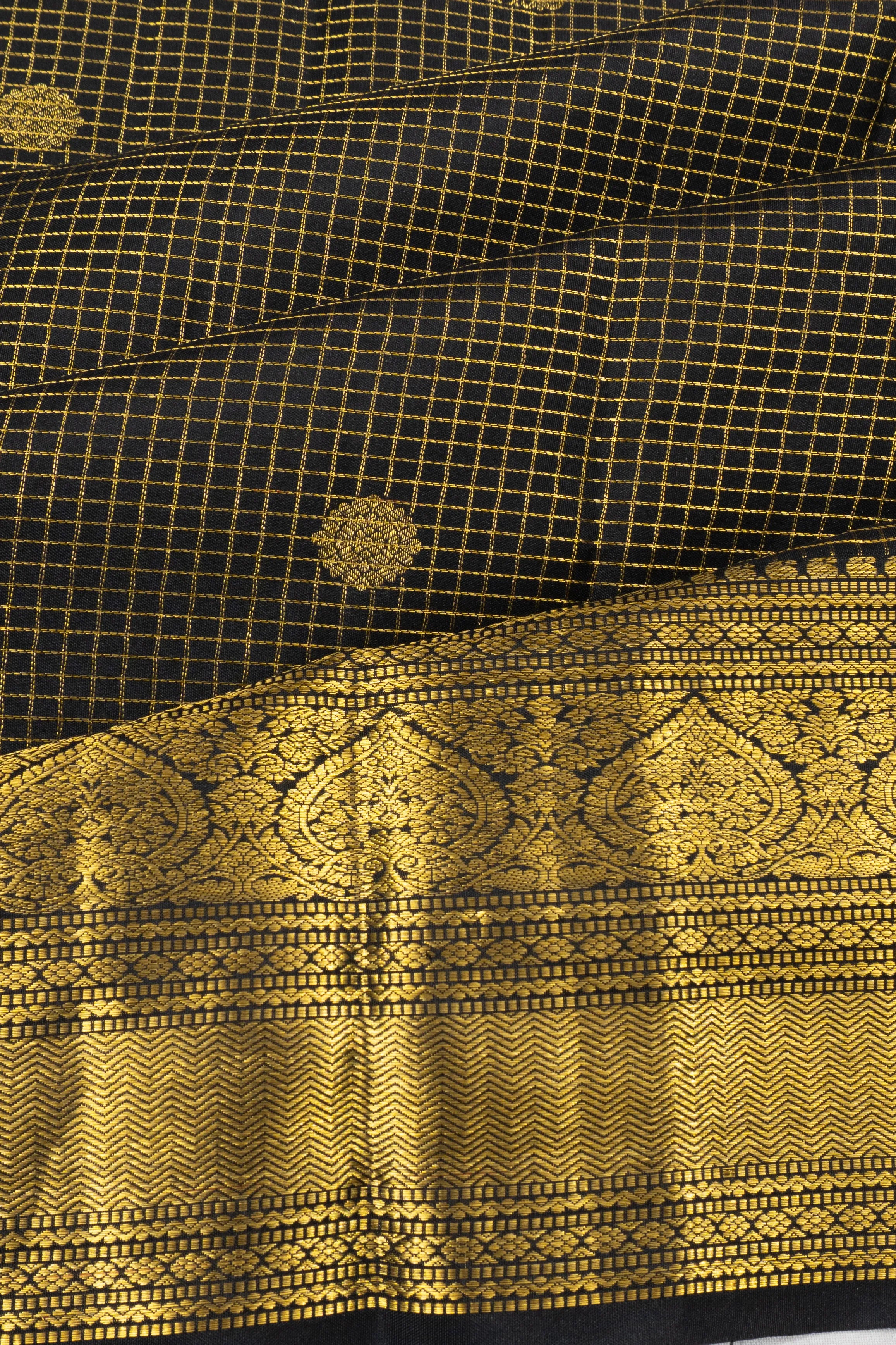 Taranga Kanchi Silk Checks And Butta Black Saree