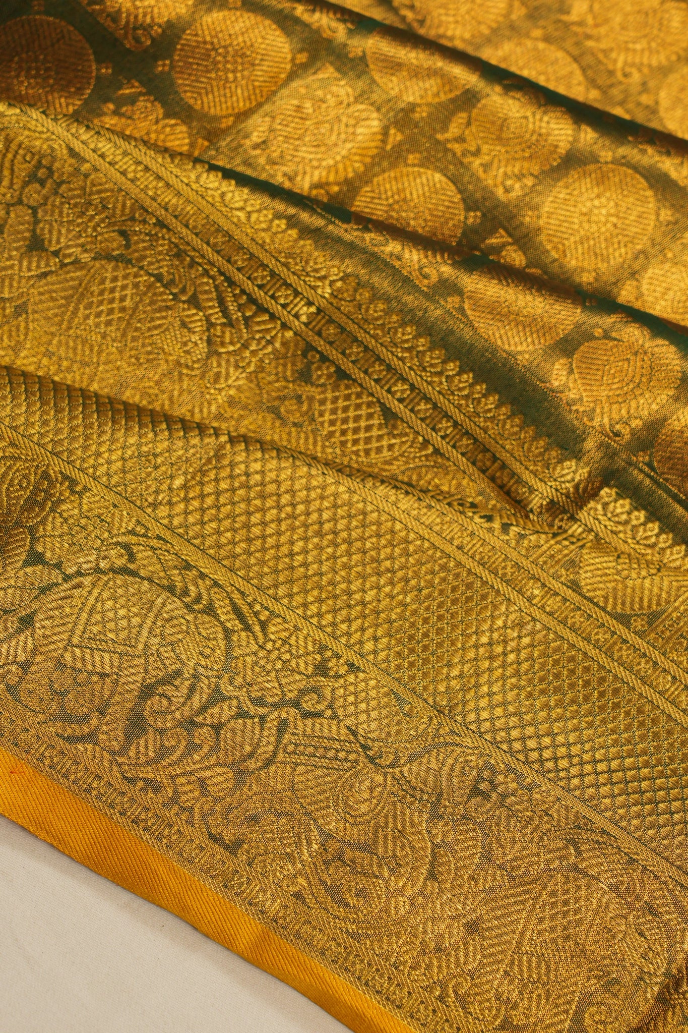 Kanchipuram Silk Tissue Butta Dark Green Saree