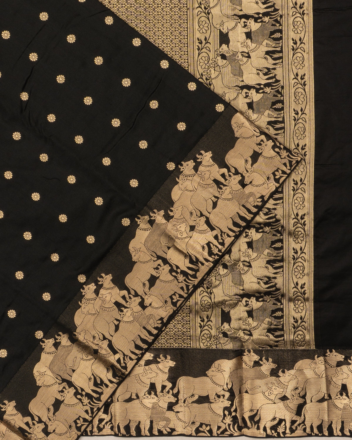 Taranga Kanchi Silk Butta Black Saree With Pichwai Border