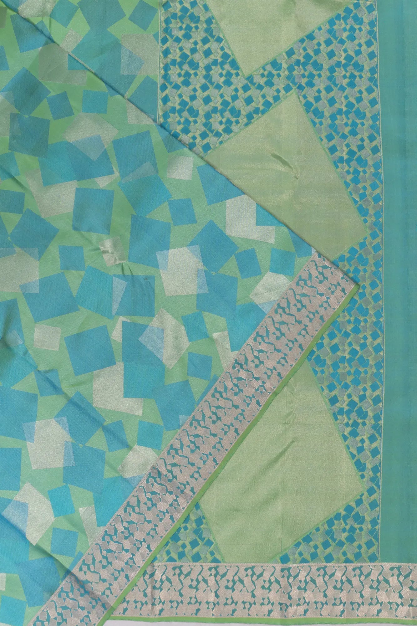 Taranga Kanchi Silk Geometrical Brocade Green Saree