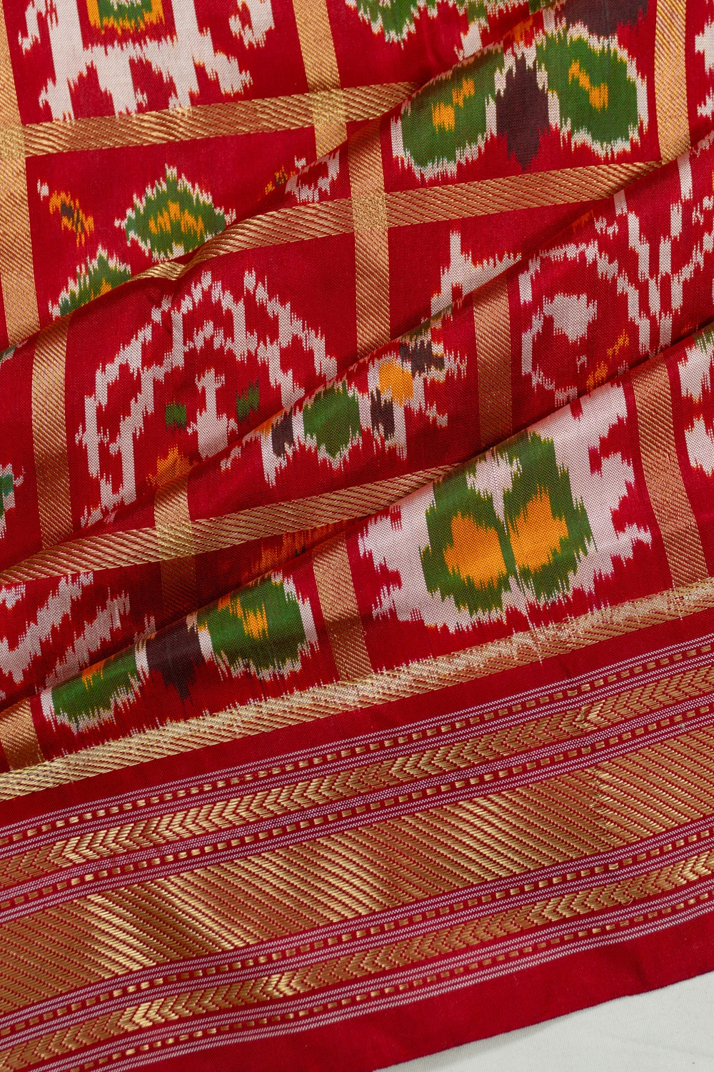 Pochampally Silk Ikat Checks And Butta Floral Red Saree With 16 Motifs
