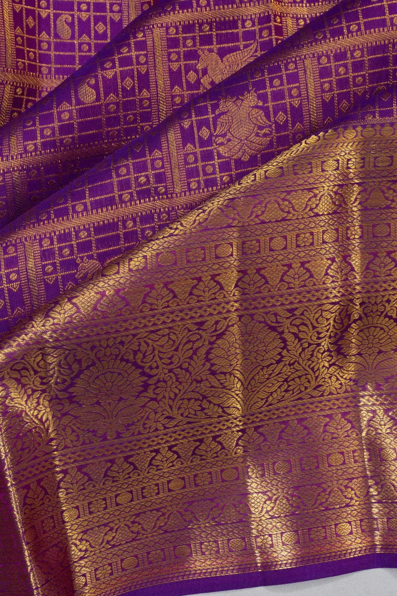 Taranga Kanchi Silk Checks And Butta Violet Saree