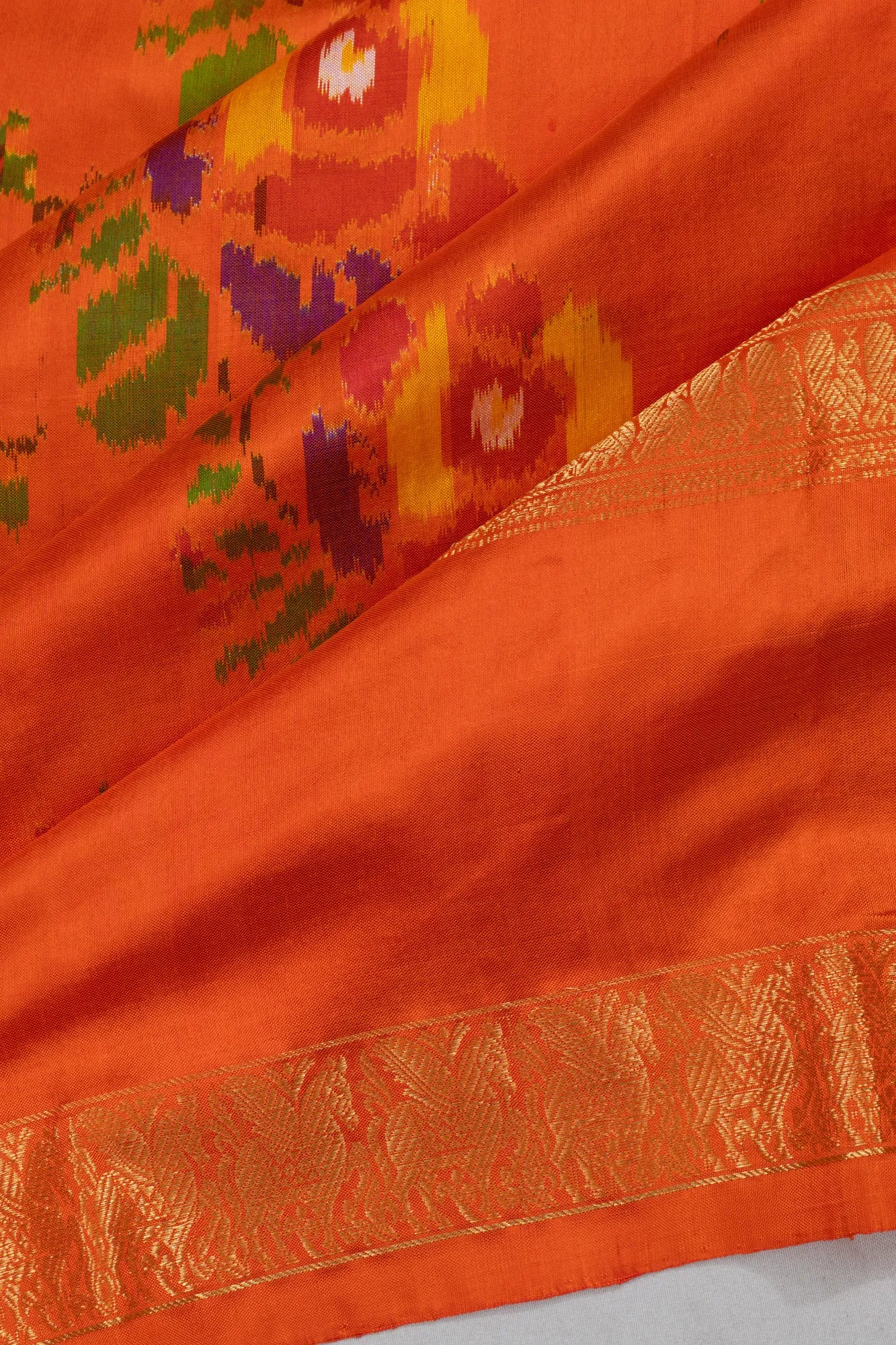 Kanchipuram Silk Ikat Orange Saree With Rettai Pettu Border