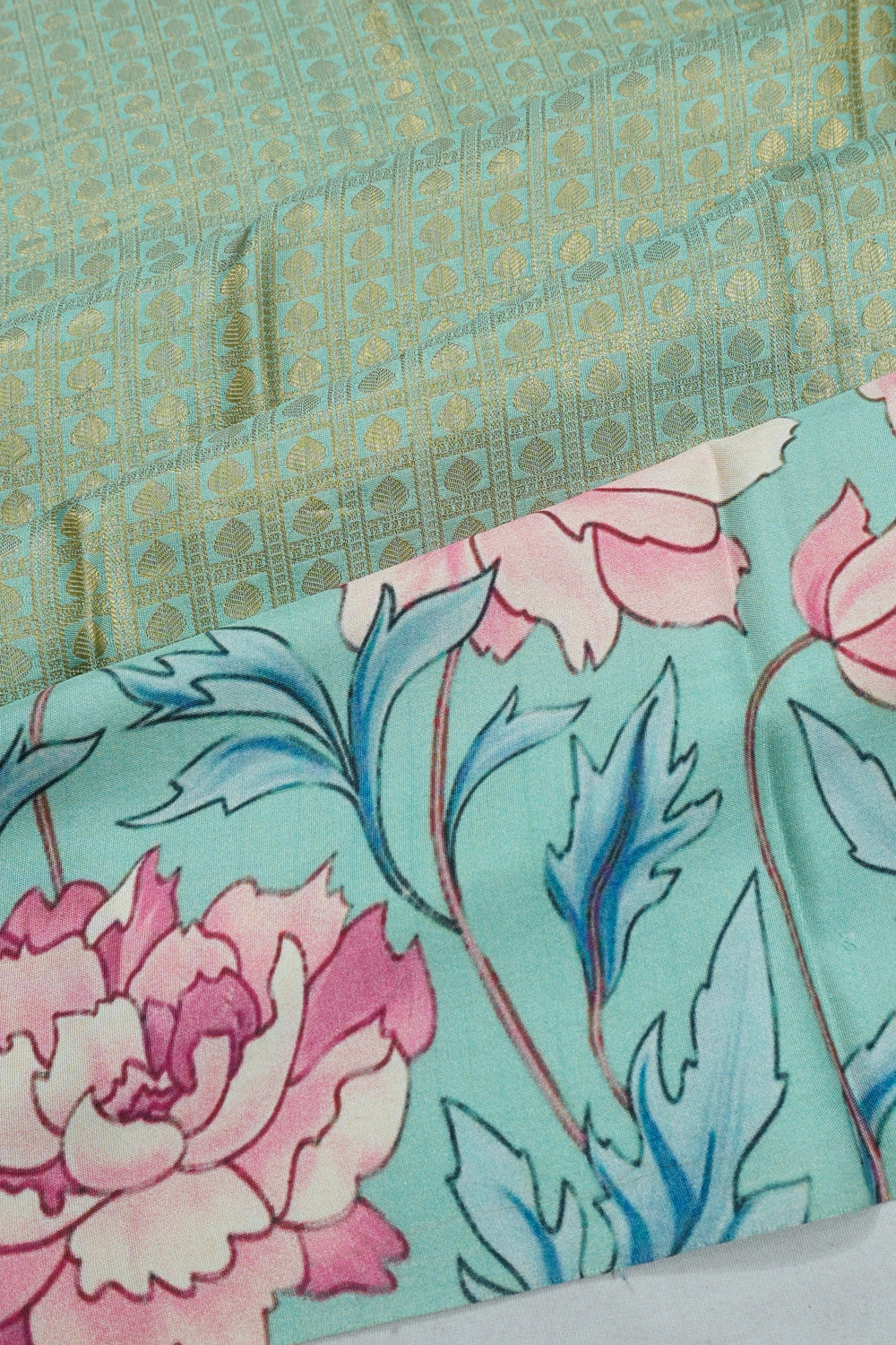 Taranga Kanchi Silk Brocade Green Saree With Satin Flroal Printed Border