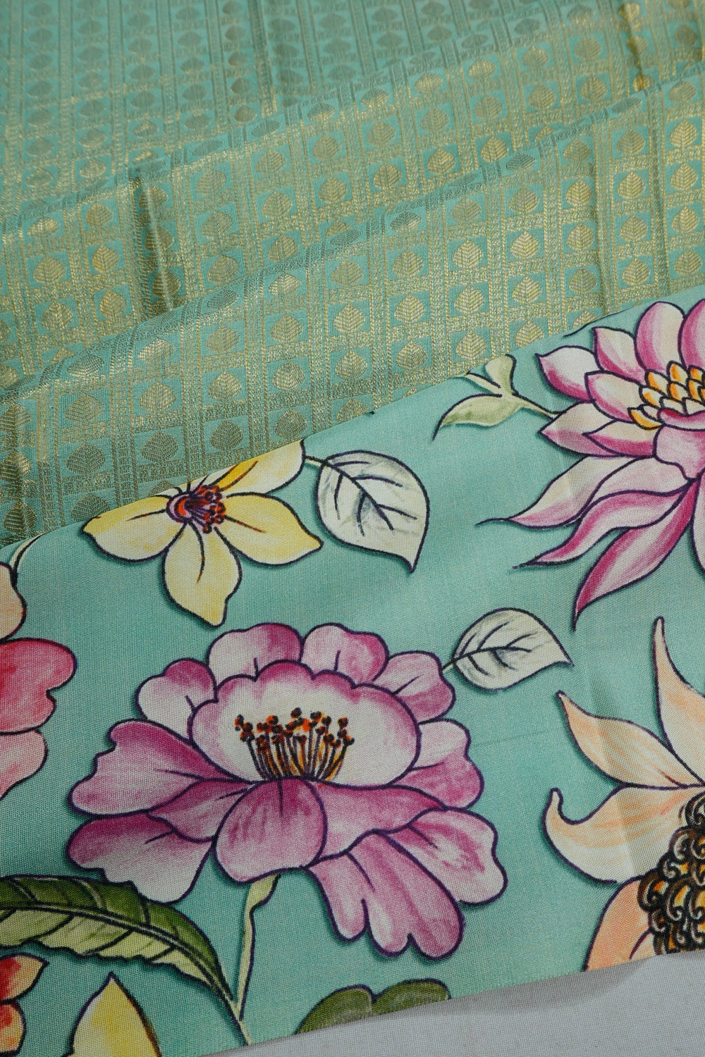 Taranga Kanchi Silk Brocade Green Saree With Satin Flroal Printed Border