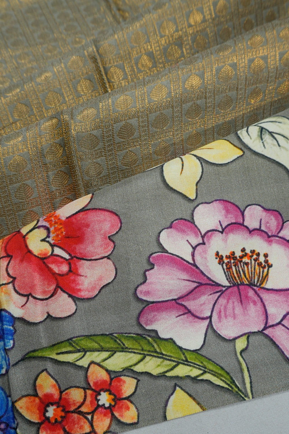 Taranga Kanchi Silk Brocade Grey Saree With Satin Flroal Printed Border