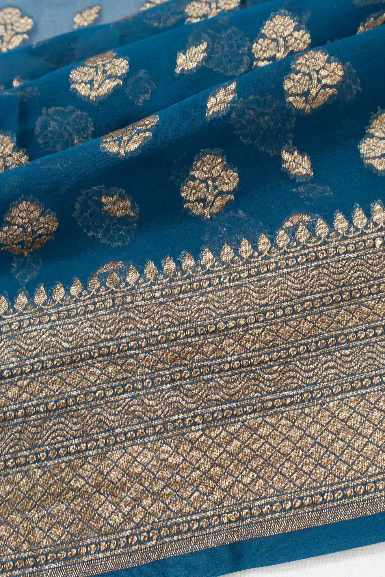 Vaanya Banaras Georgette Butta Blue Saree