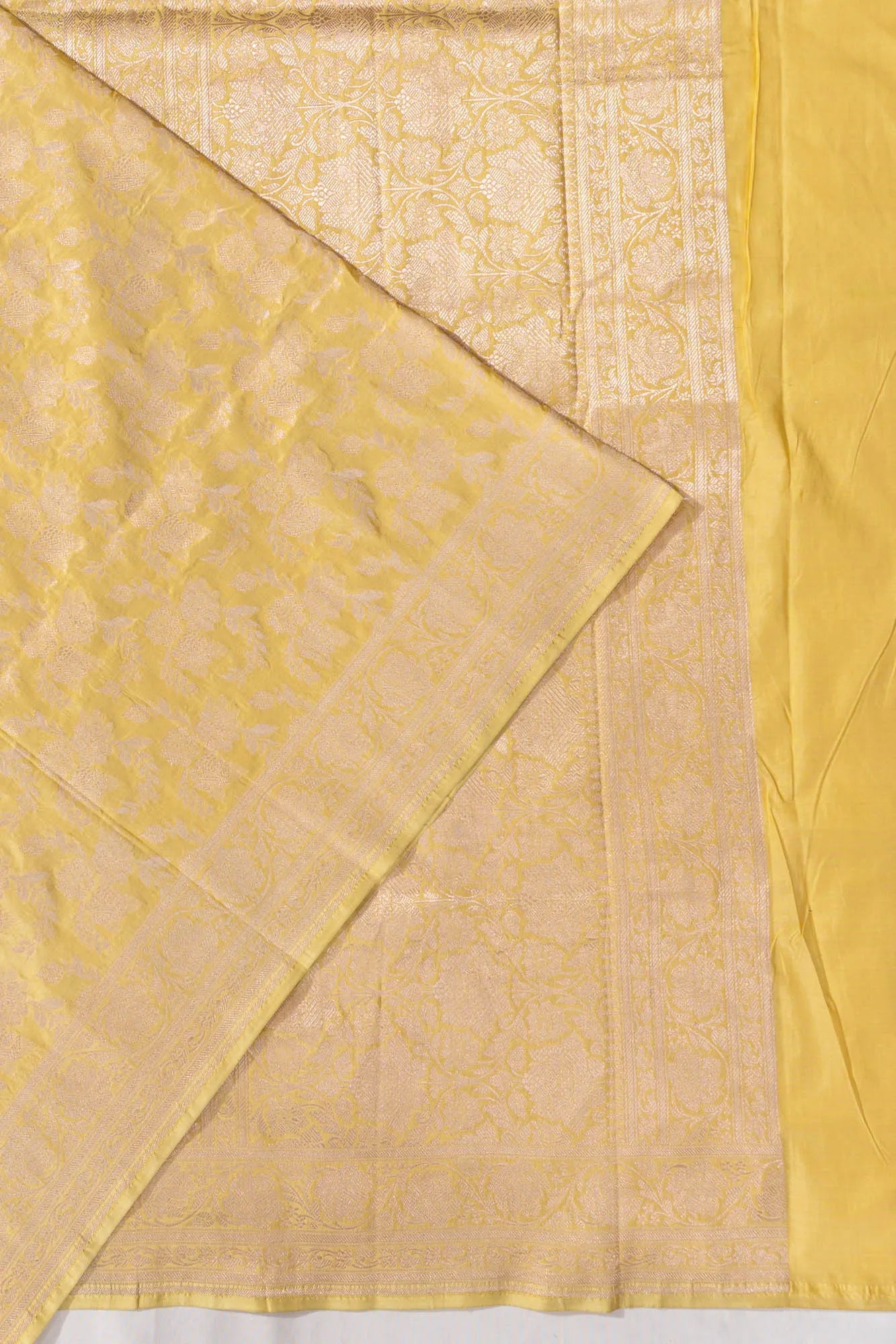 Vaanya Banaras Jaal Pale Yellow Saree