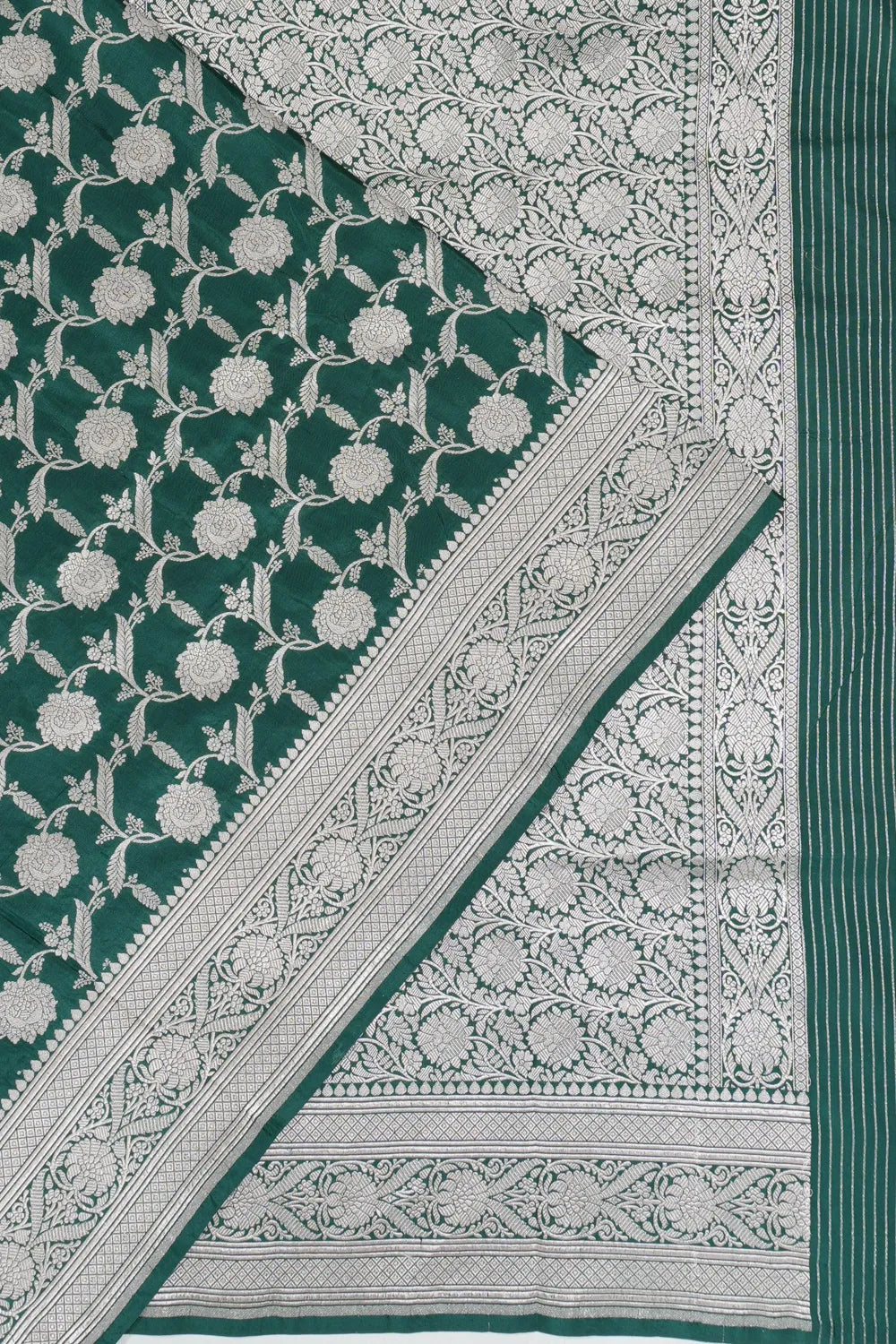 Vaanya Banaras Jaal Dark Green Saree