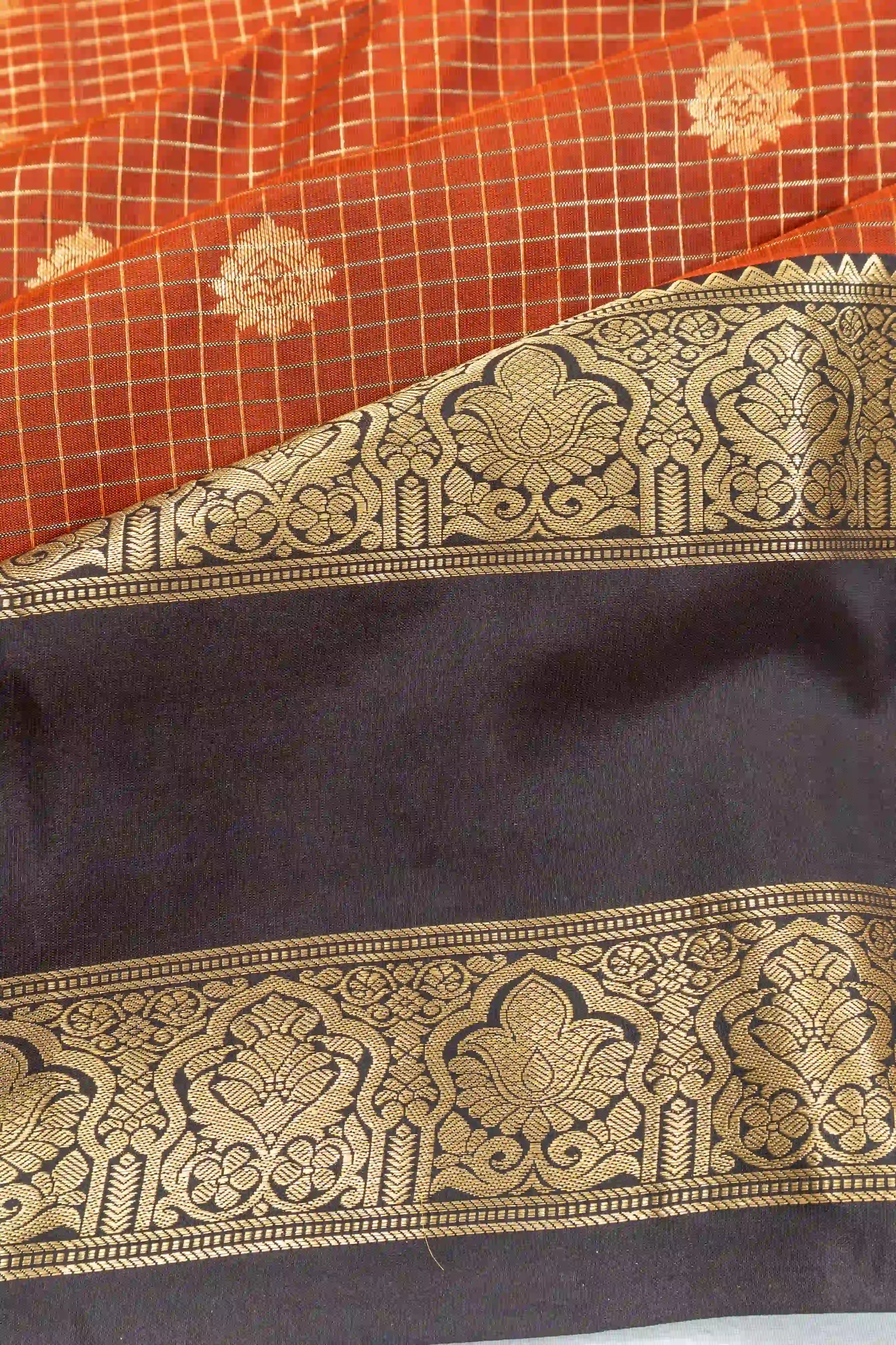 Taranga Kanchi Silk Checks And Butta Rust Orange Saree With Rettai Pettu Border