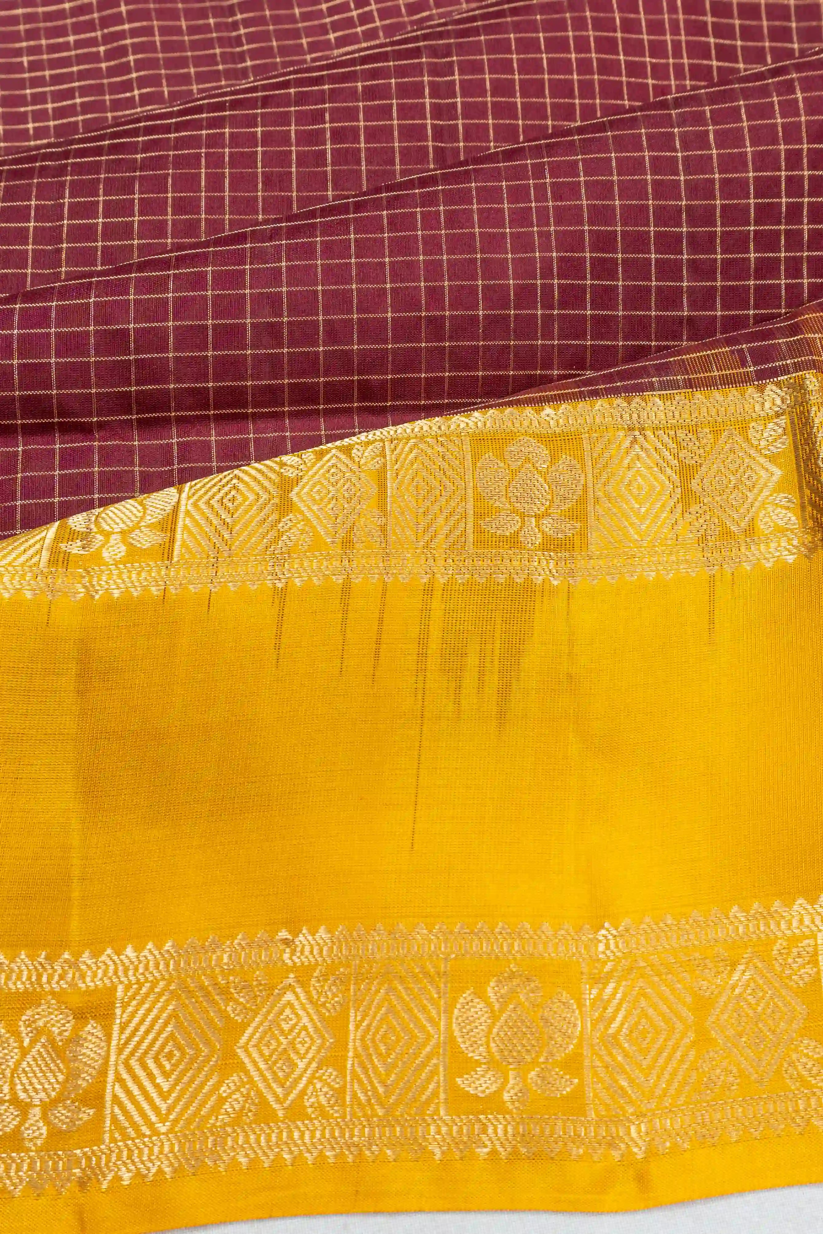 Taranga Kanchi Silk Checks Maroon Saree With Rettai Pettu Border