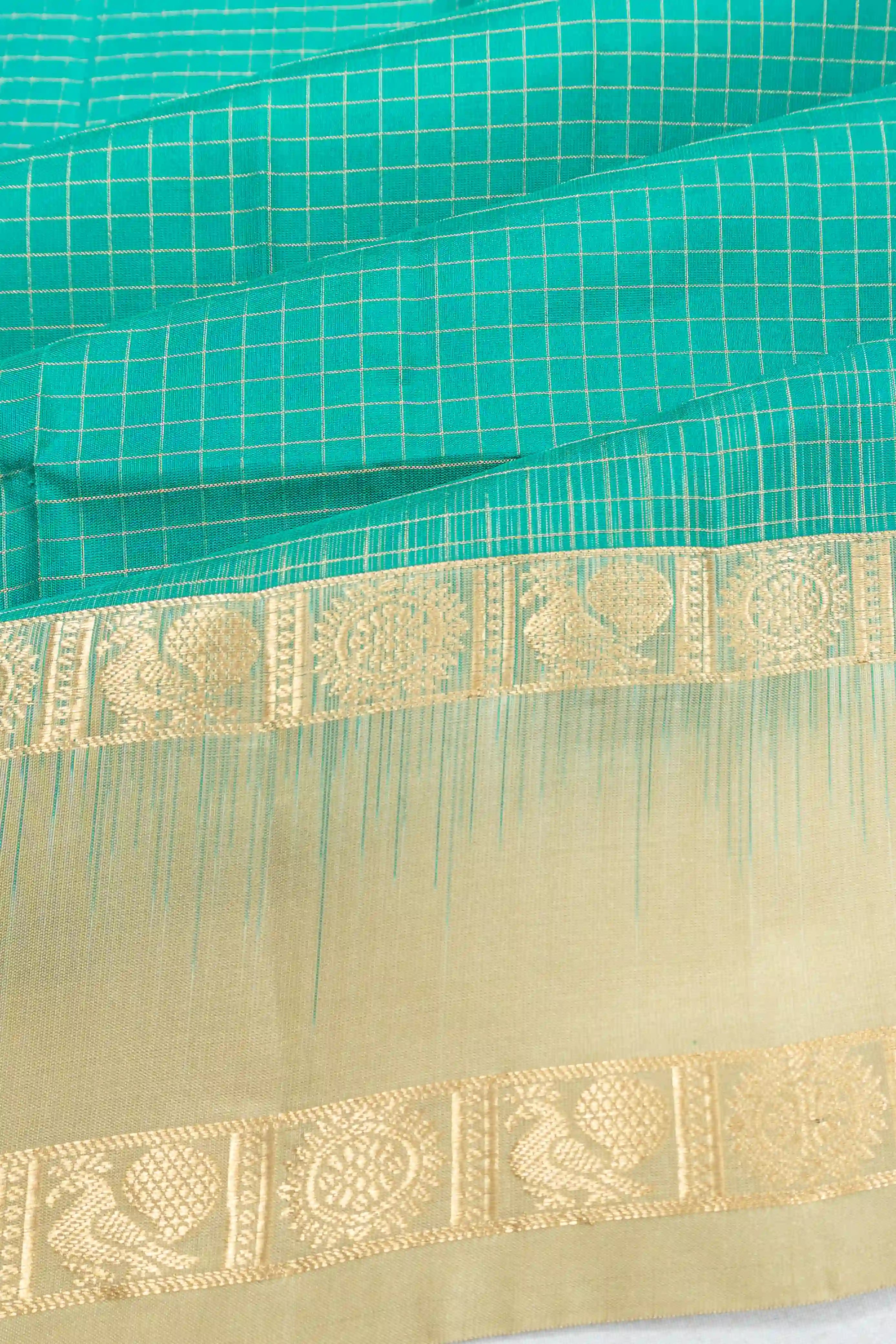 Taranga Kanchi Silk Checks Sky Blue Saree With Rettai Pettu Border