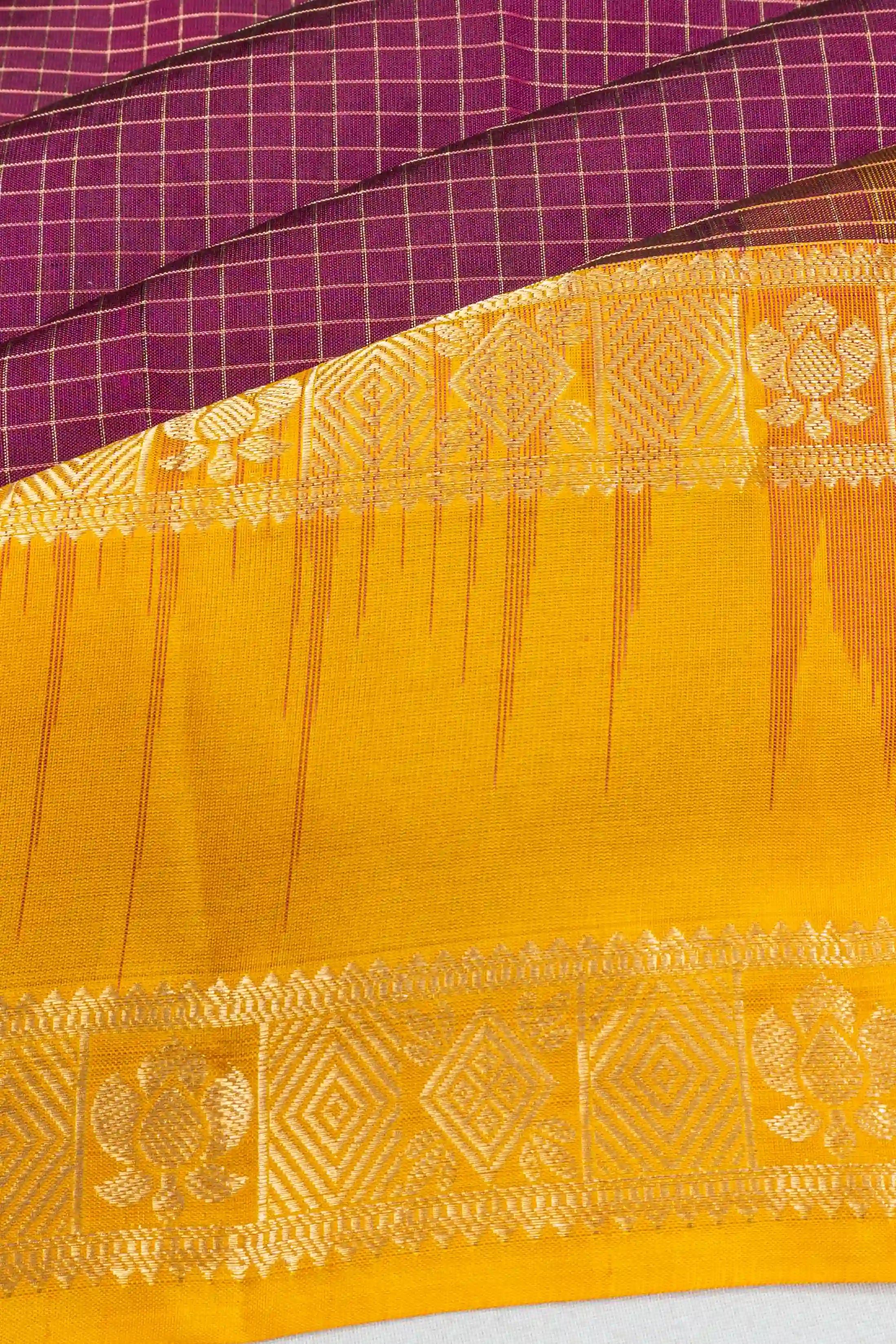 Taranga Kanchi Silk Checks Maroon Saree With Rettai Pettu Border
