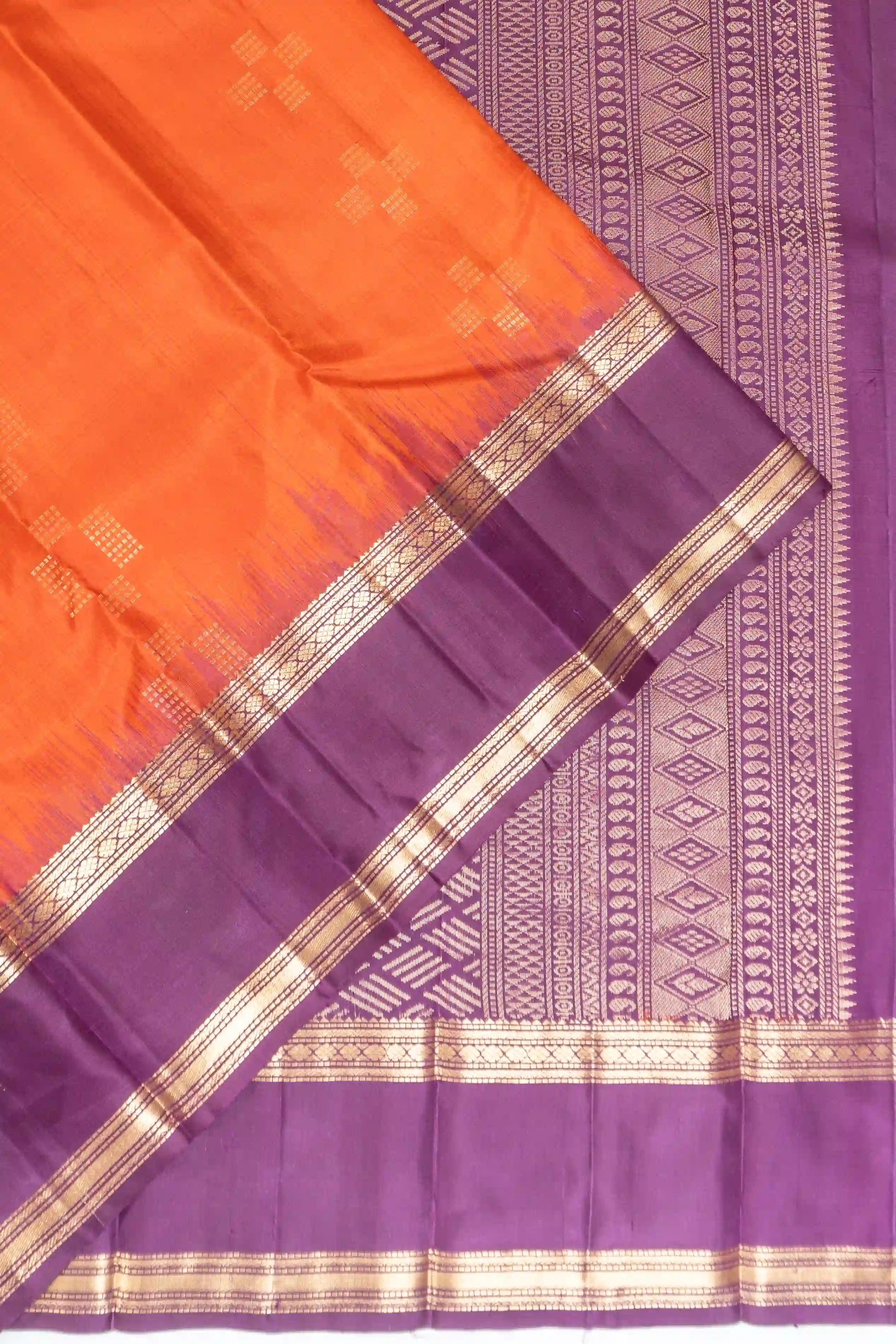 Taranga Kanchi Silk Butta Orange Saree With Rettai Pettu Border