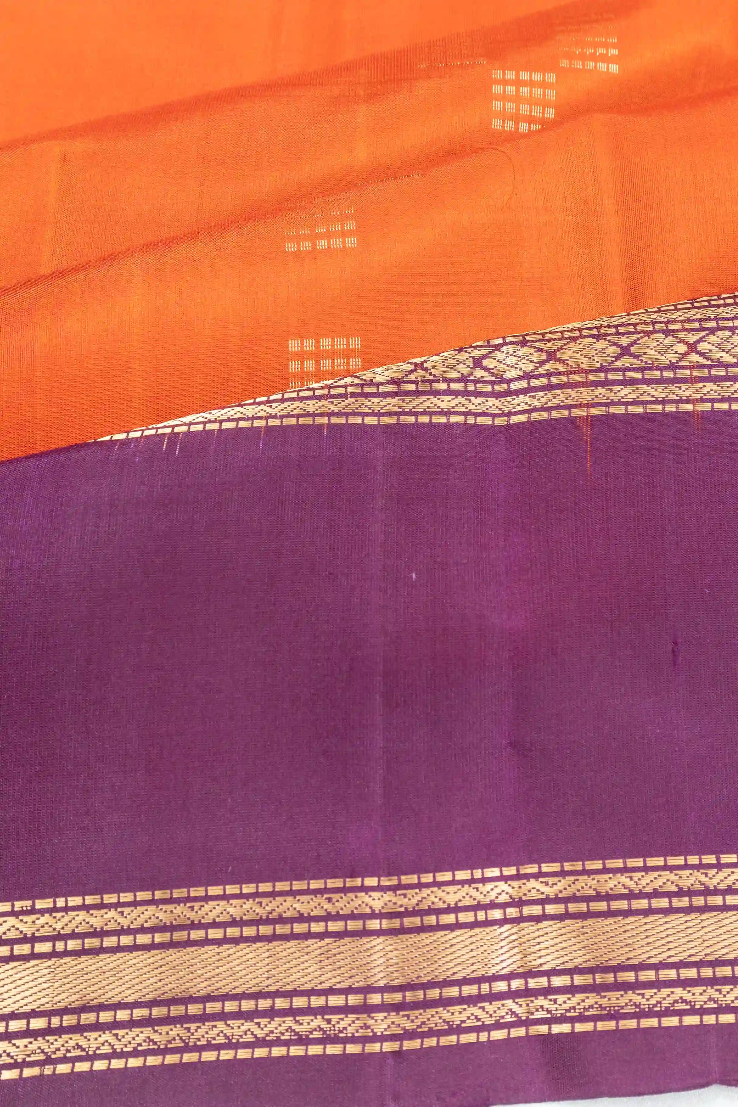 Taranga Kanchi Silk Butta Orange Saree With Rettai Pettu Border