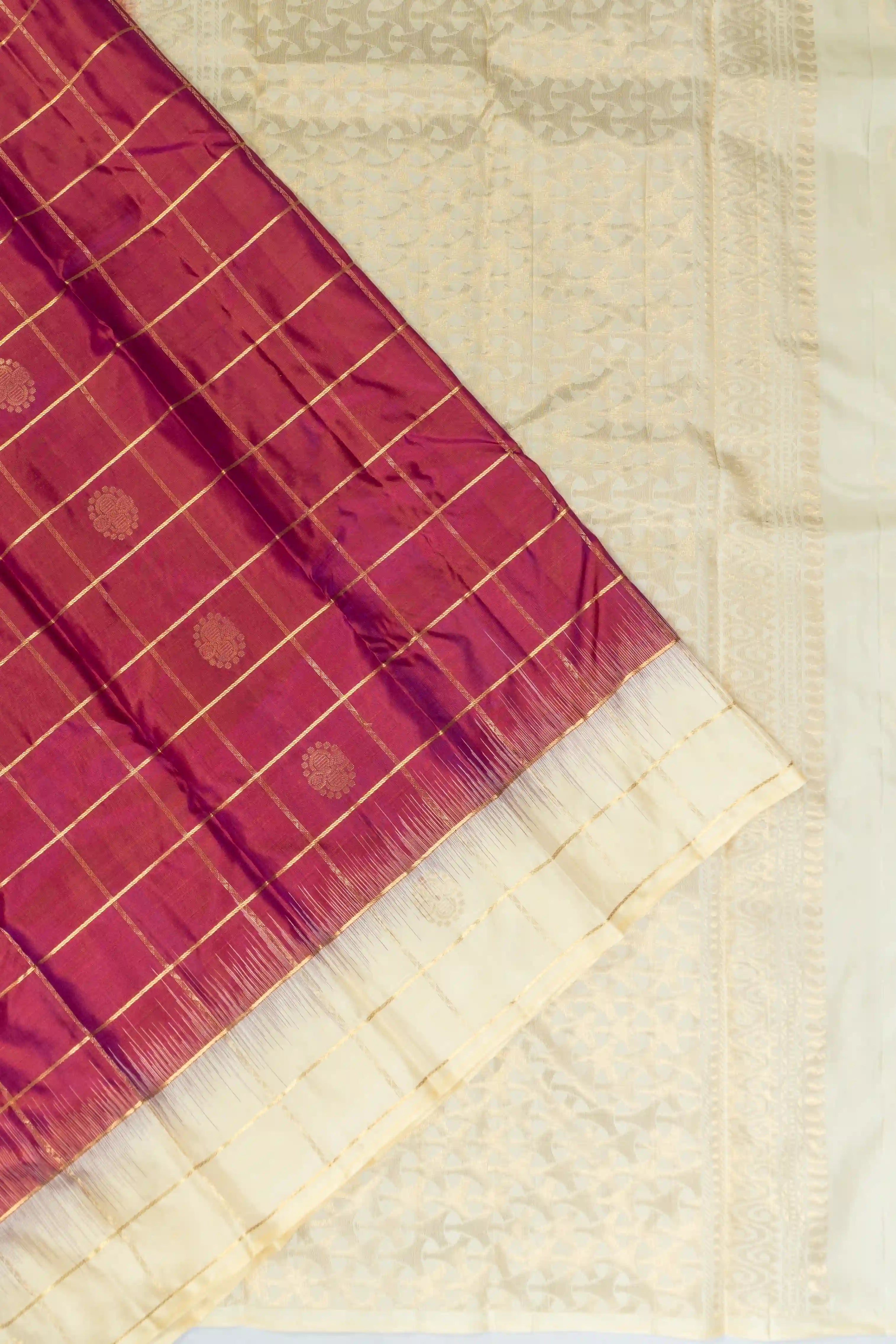 Taranga Kanchi Silk Checks And Butta Maroon Saree