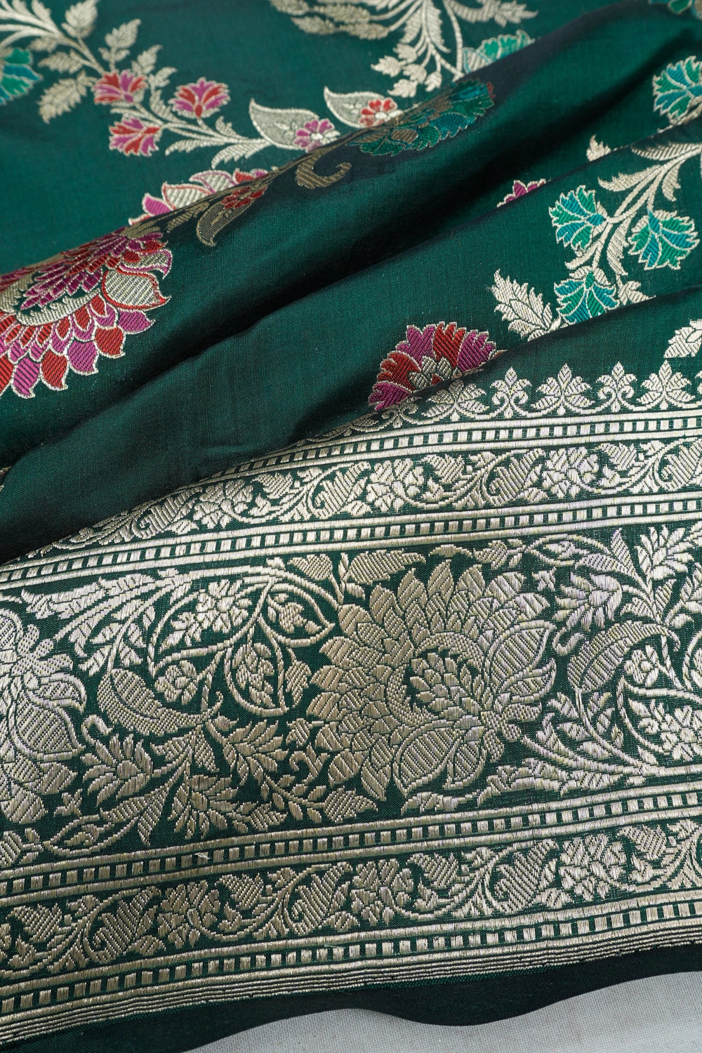 Vaanya Banaras Silk Jaal Bottle Green Saree