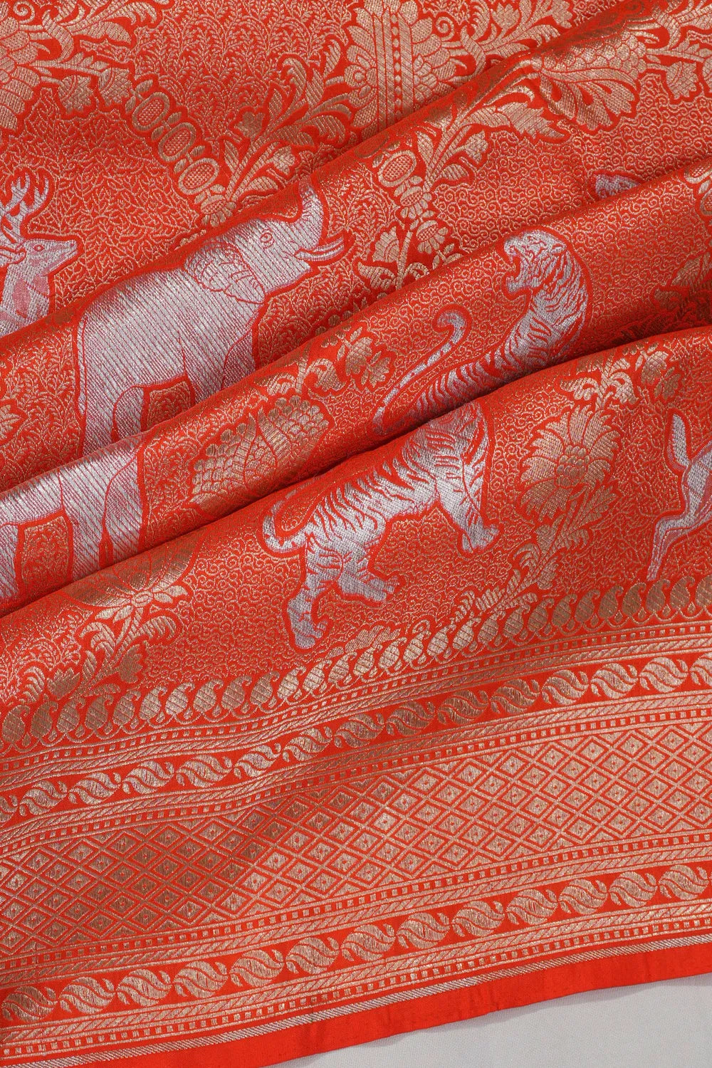 Banarasi Silk Jaal And Butta Orange Saree
