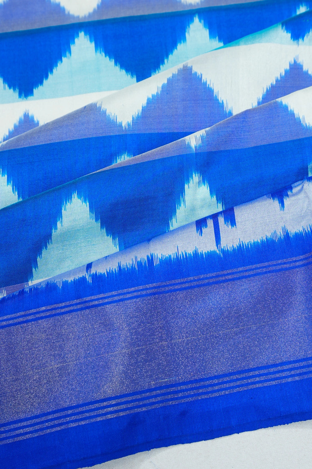 Pochampally Silk Ikat White And Blue Saree