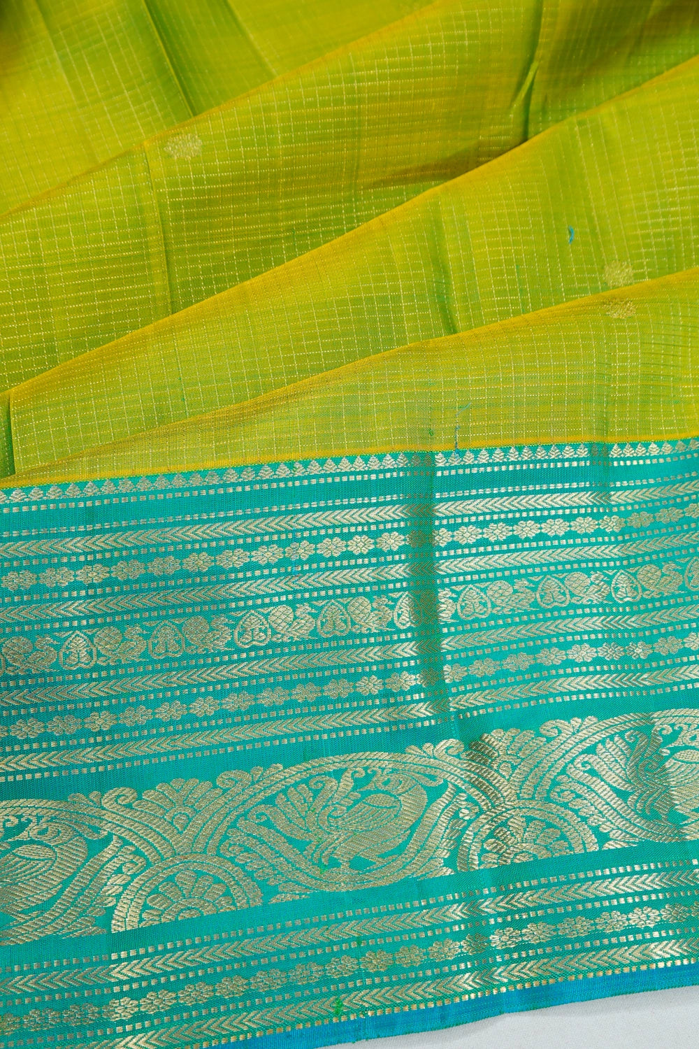 Kanchipuram Silk Checks And Butta Mehendi Green Saree