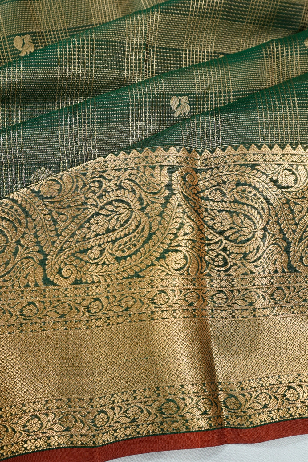 Taranga Kanchi Silk Oosi Lines And Butta Bottle Green Saree