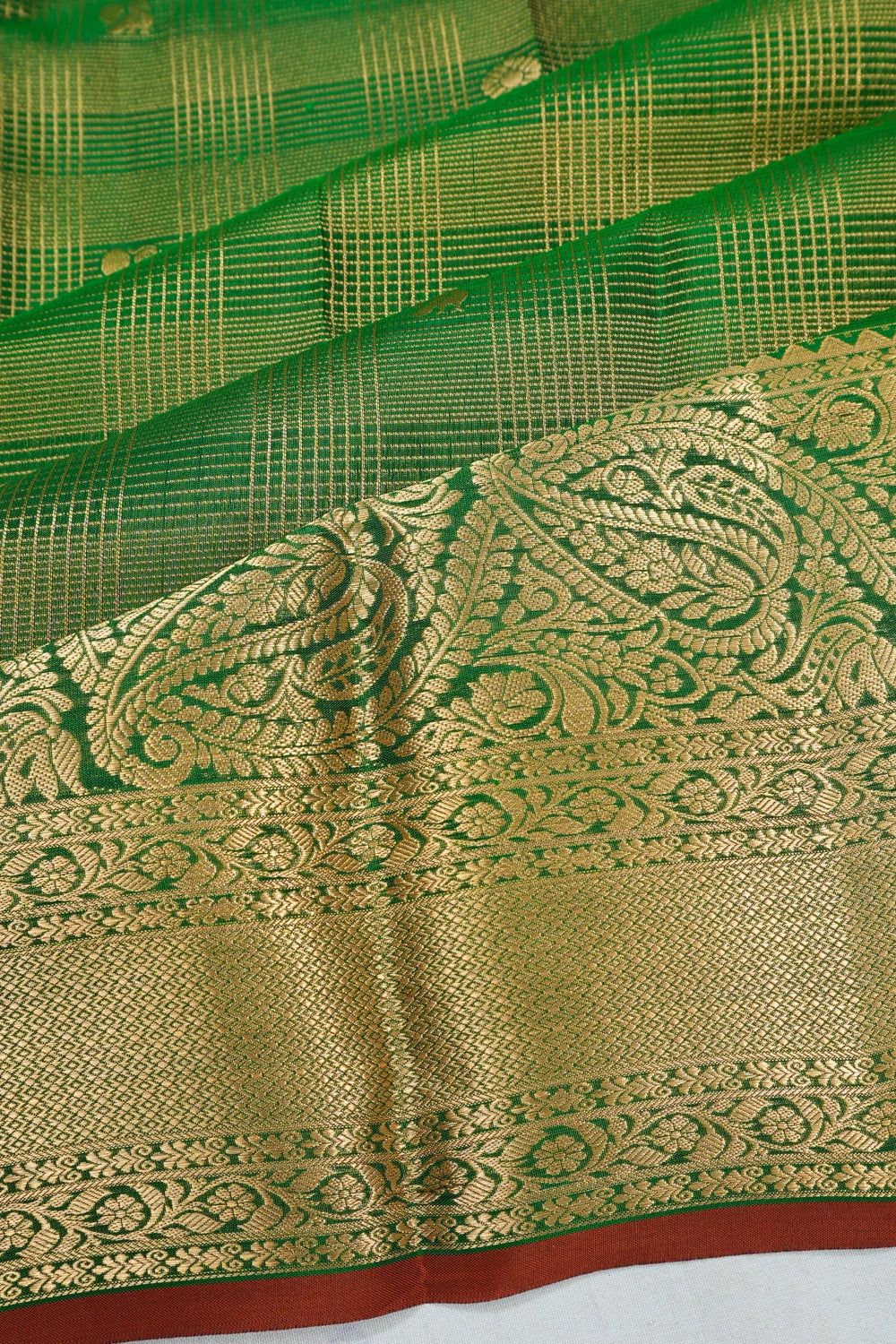 Taranga Kanchi Silk Oosi Lines And Butta Green Saree