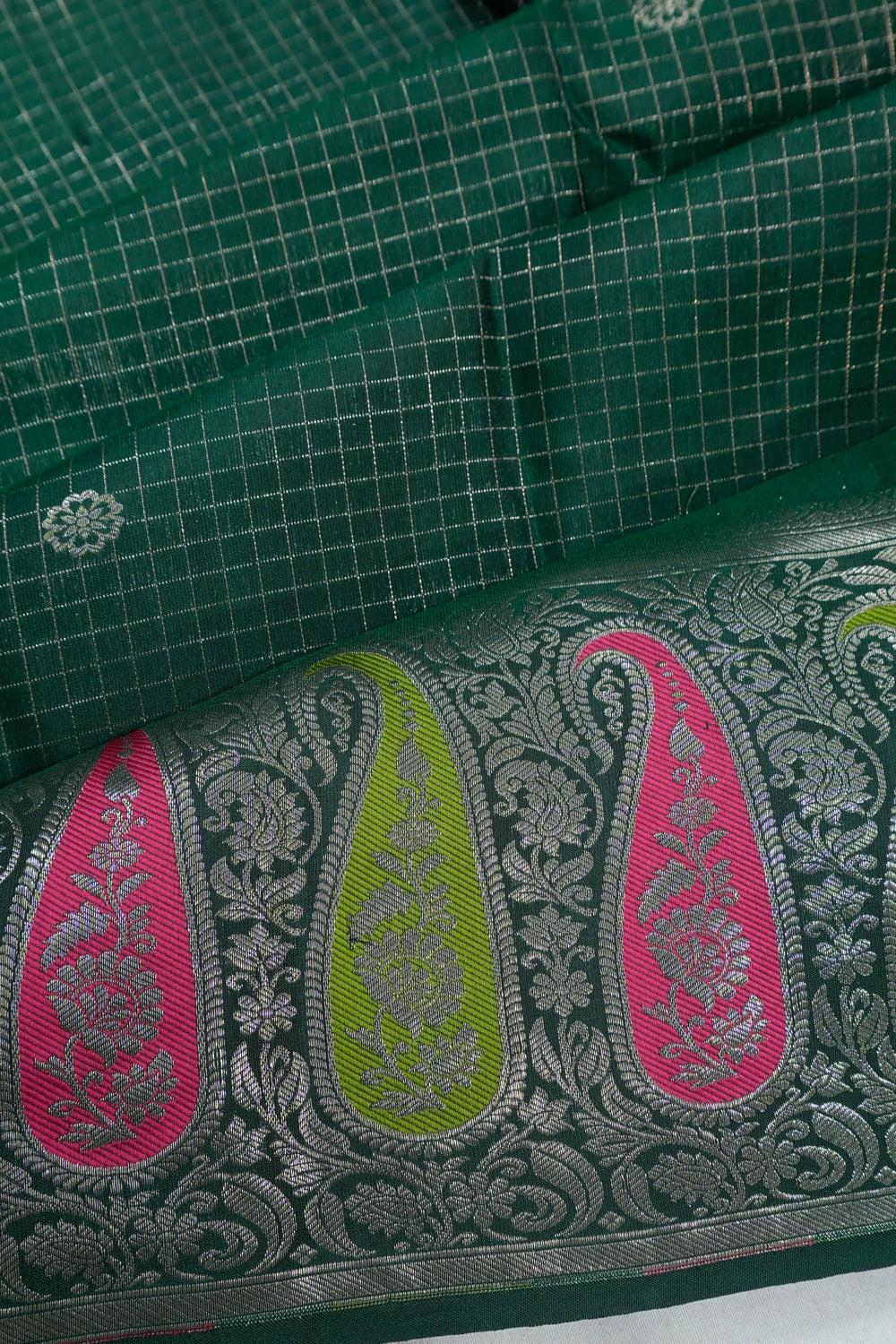 Taranga Kanchi Silk Oosi Lines And Butta Bottle Green Saree