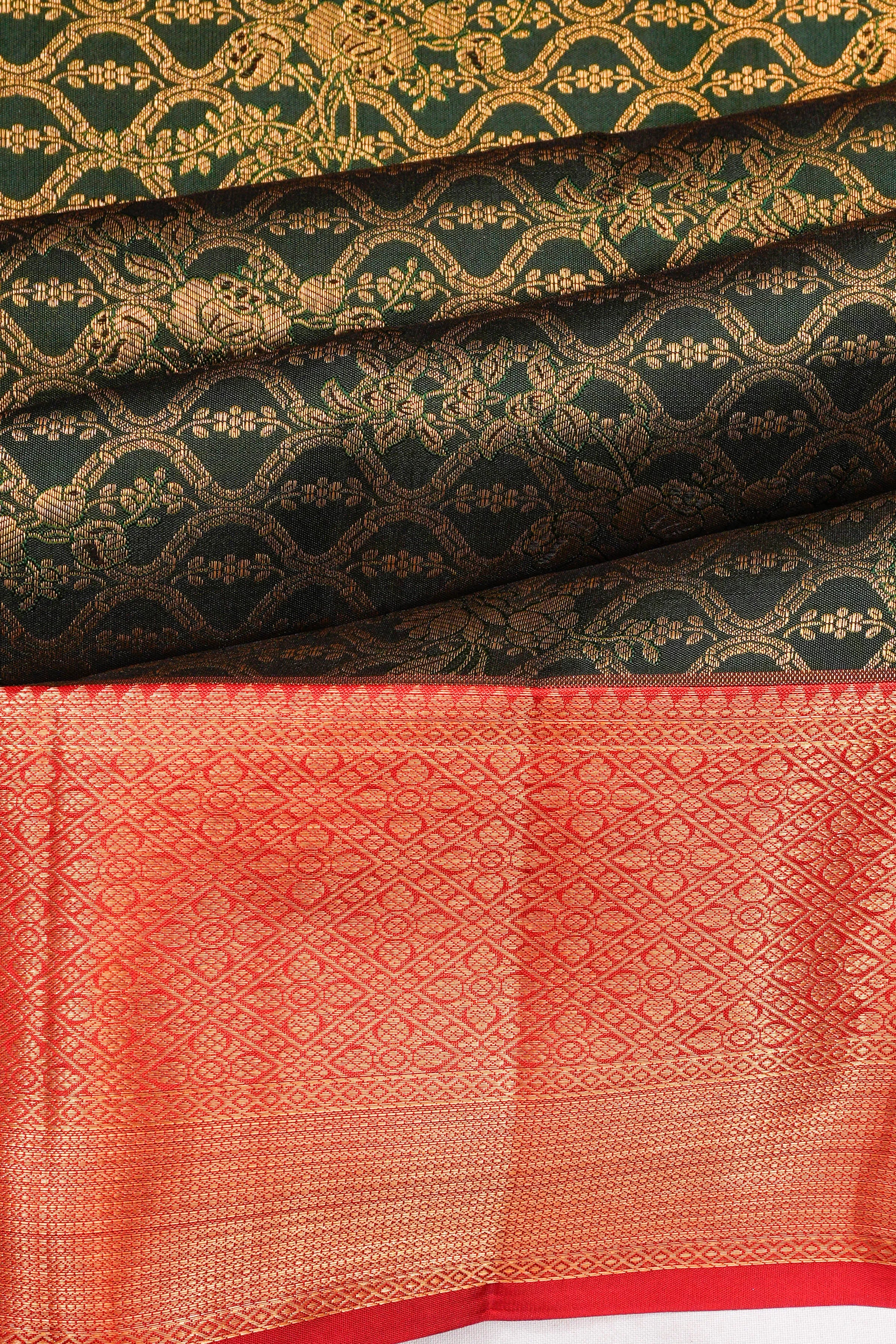 Taranga Kanchi Silk Brocade Bottle Green Saree