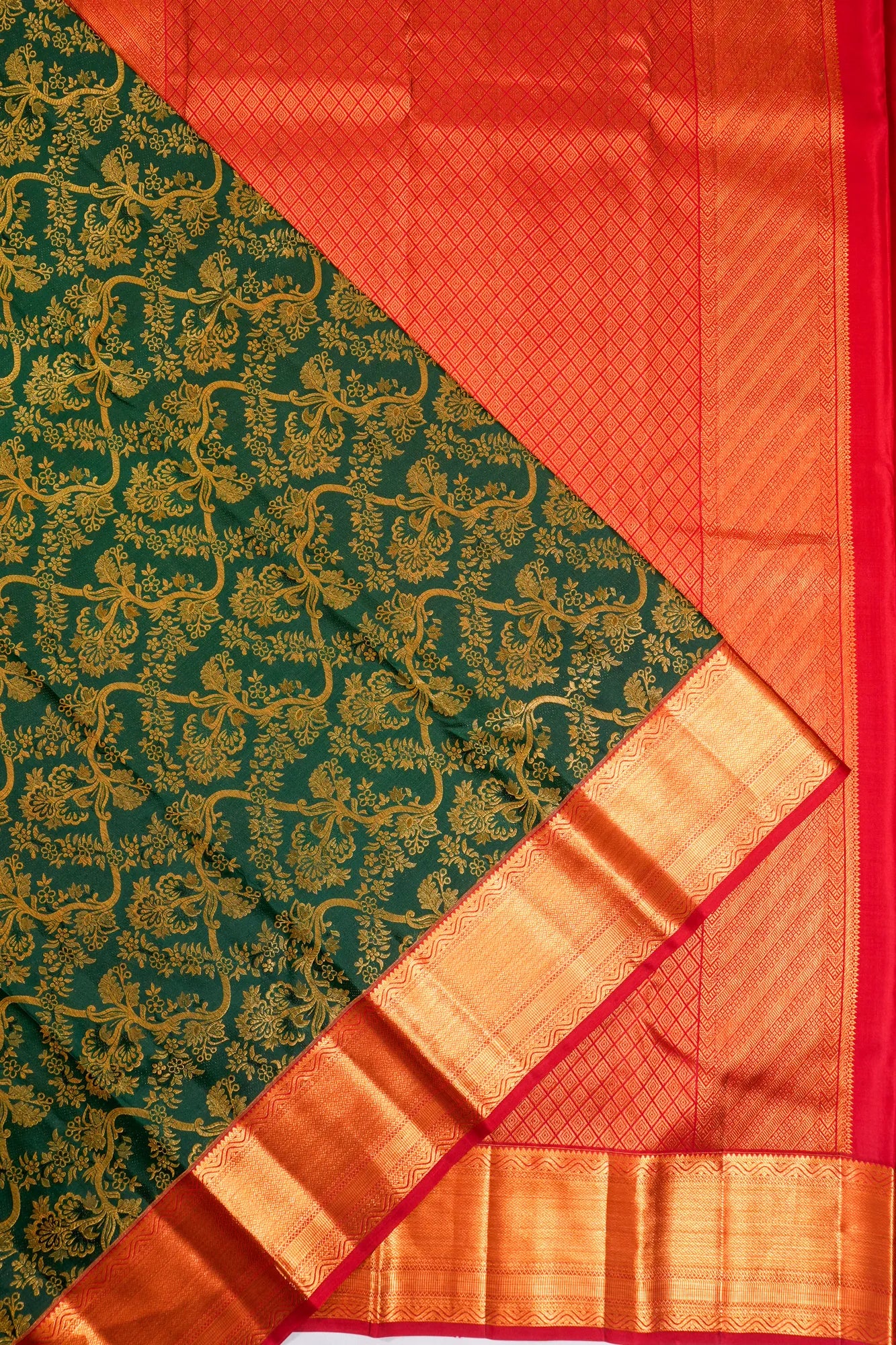 Taranga Kanchi Silk Jaal Bottle Green Saree