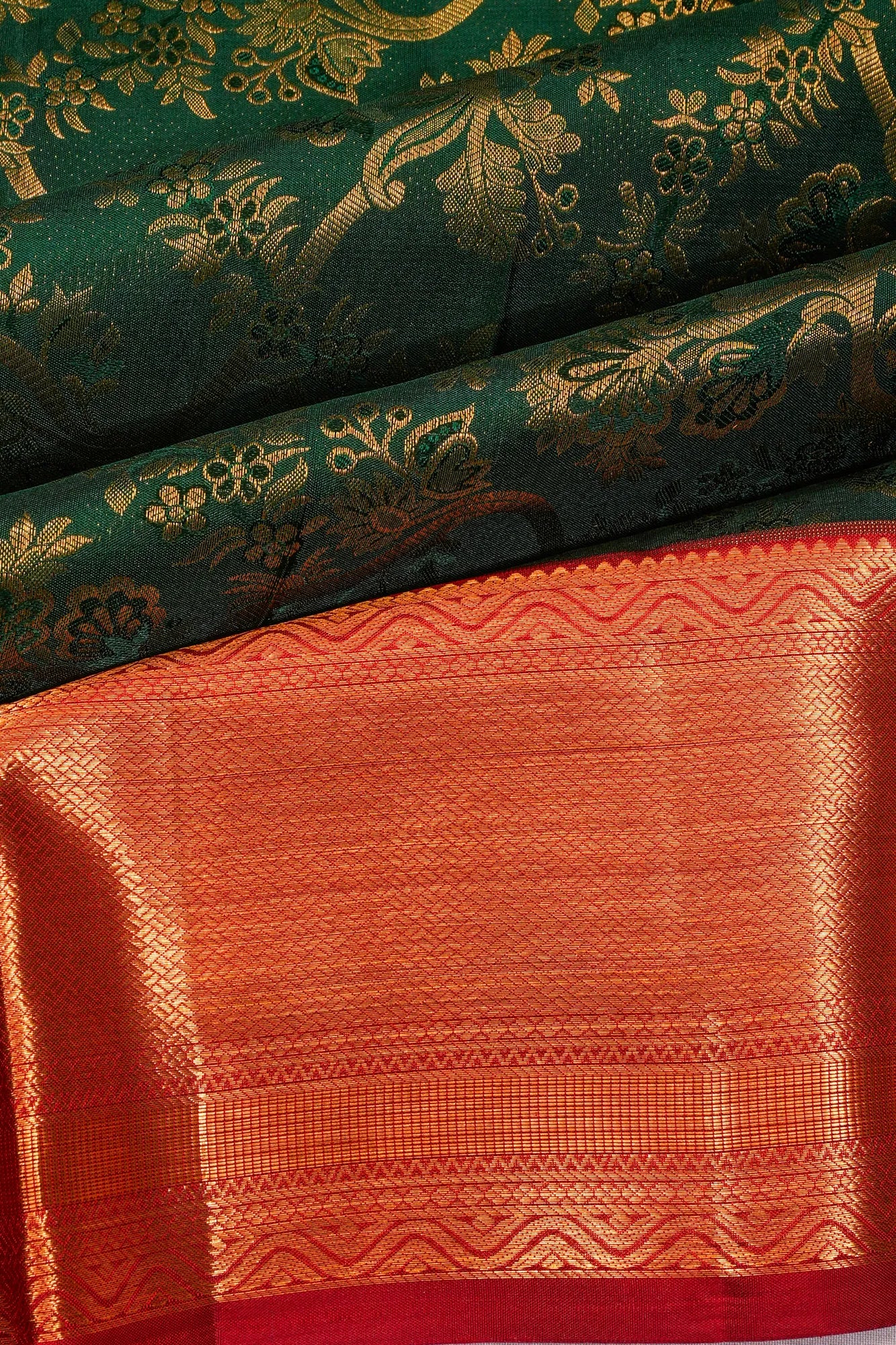 Taranga Kanchi Silk Jaal Bottle Green Saree