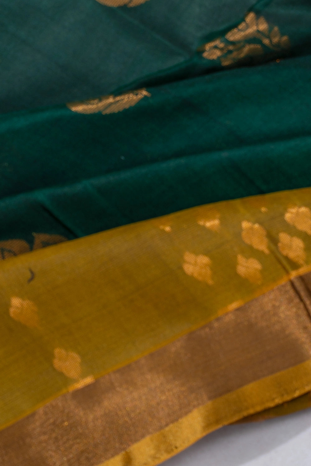 Uppada Silk Butta Bottle Green Saree
