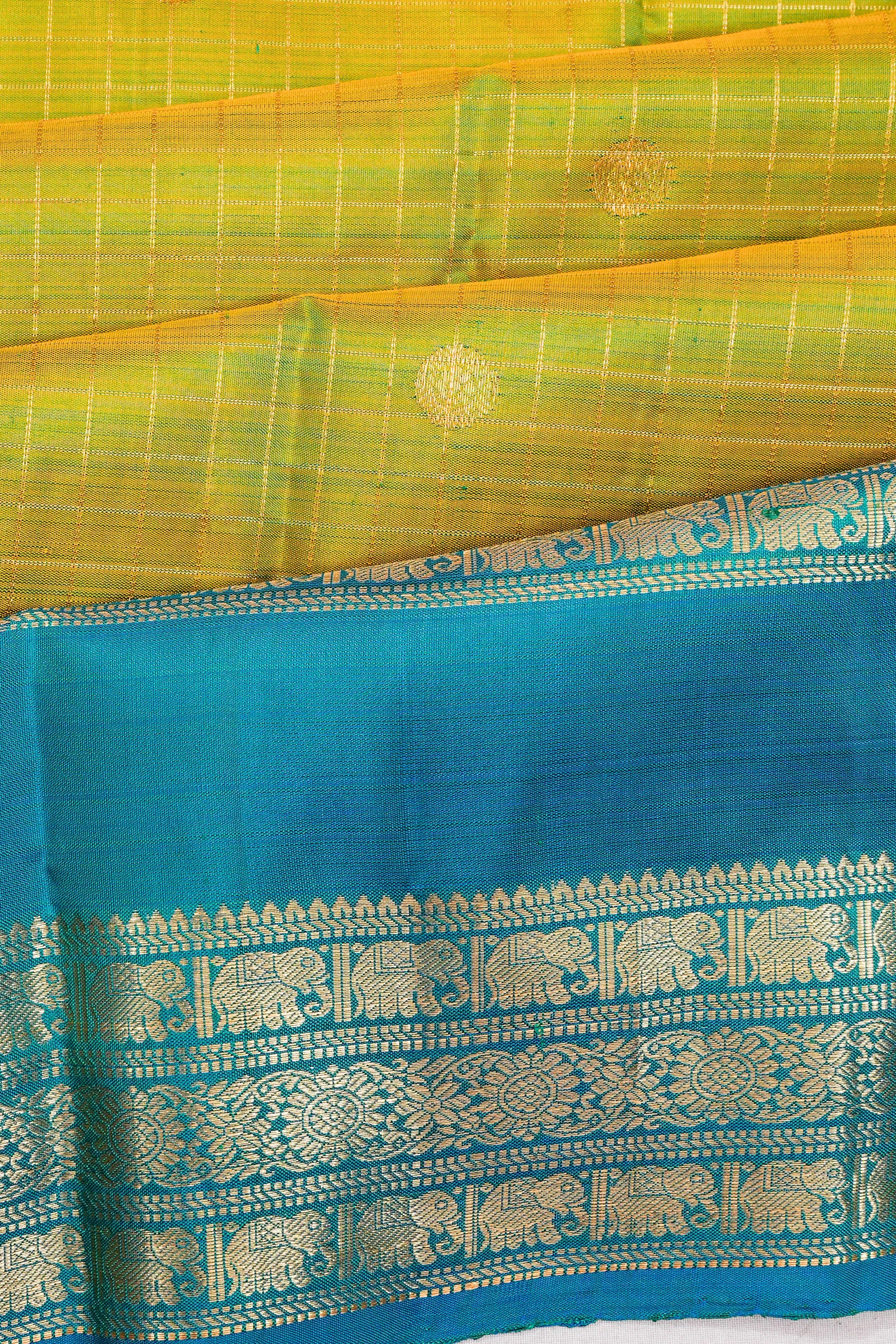 Taranga Kanchi Silk Checks And Butta Green Saree