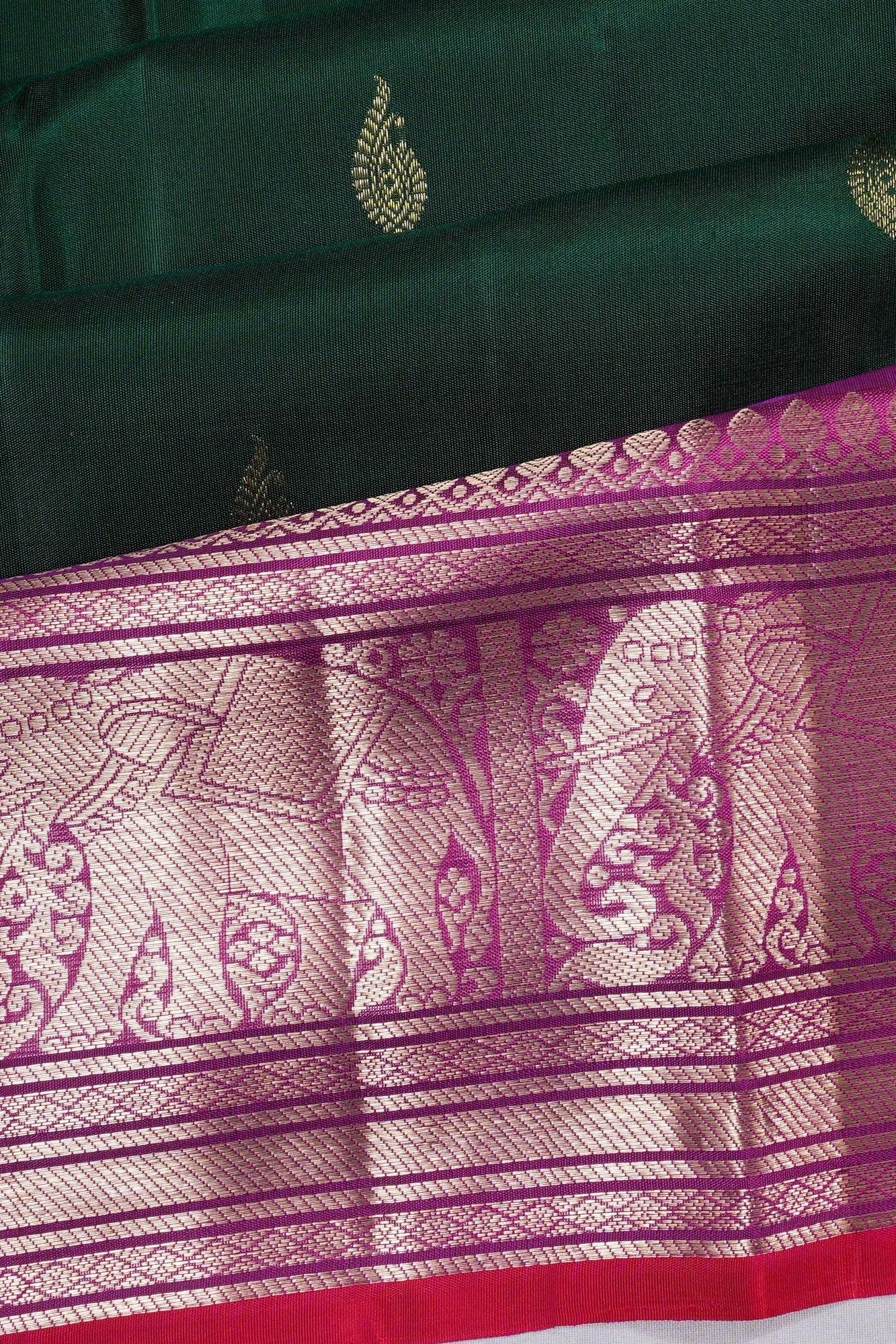 Taranga Kanchi Silk Butta Bottle Green Saree